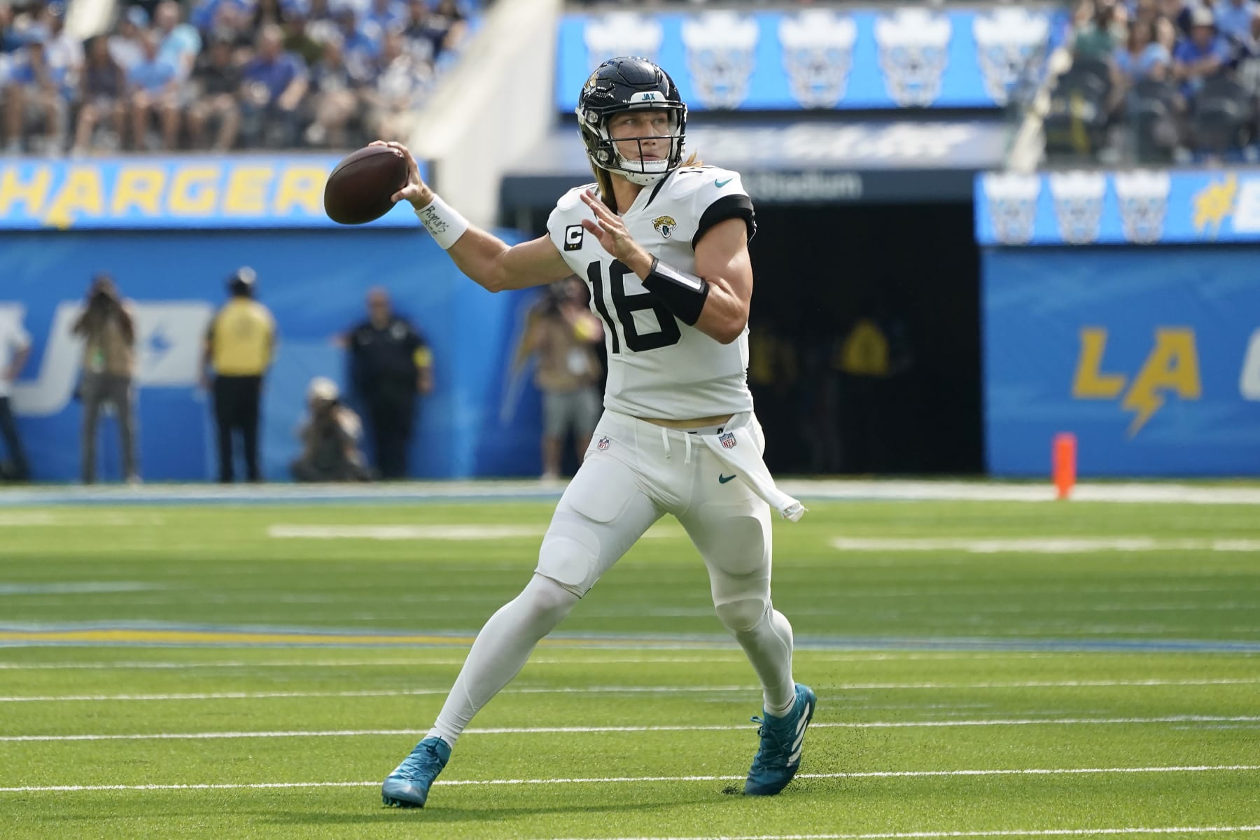 Jacksonville Jaguars quarterback Trevor Lawrence (16) passes against the Los Angeles Chargers during the first half of an NFL football game in Inglewood, Calif., Sunday, Sept. 25, 2022. (AP Photo/Marcio Jose Sanchez)