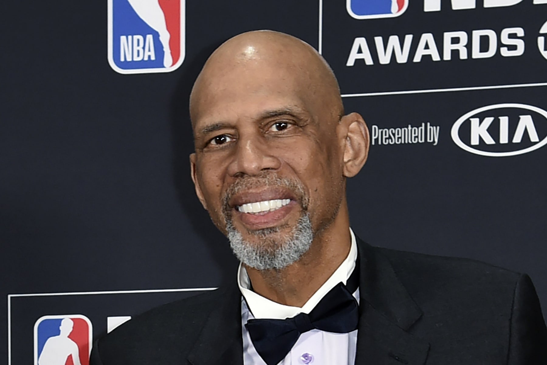FILE - Kareem Abdul-Jabbar poses in the press room at the NBA Awards in Santa Monica, Calif. on June 25, 2018. The NBA legend serves as an executive producer and narrator of the one-hour documentary “Fight the Power: The Movements That Changed America,” which airs June 19 on the History Channel. (Photo by Richard Shotwell/Invision/AP, File)