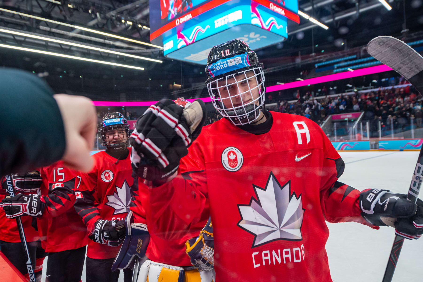 LAUSANNE, SWITZERLAND - JANUARY 22: #10 Adamo Fantilli of Canada gives a fist pump after their victory Men's 6-Team Tournament Bronze Medal Game between Canada and Finland of the Lausanne 2020 Winter Youth Olympics on January 22, 2020 in Lausanne, Switzerland. (Photo by RvS.Media/Monika Majer/Getty Images)