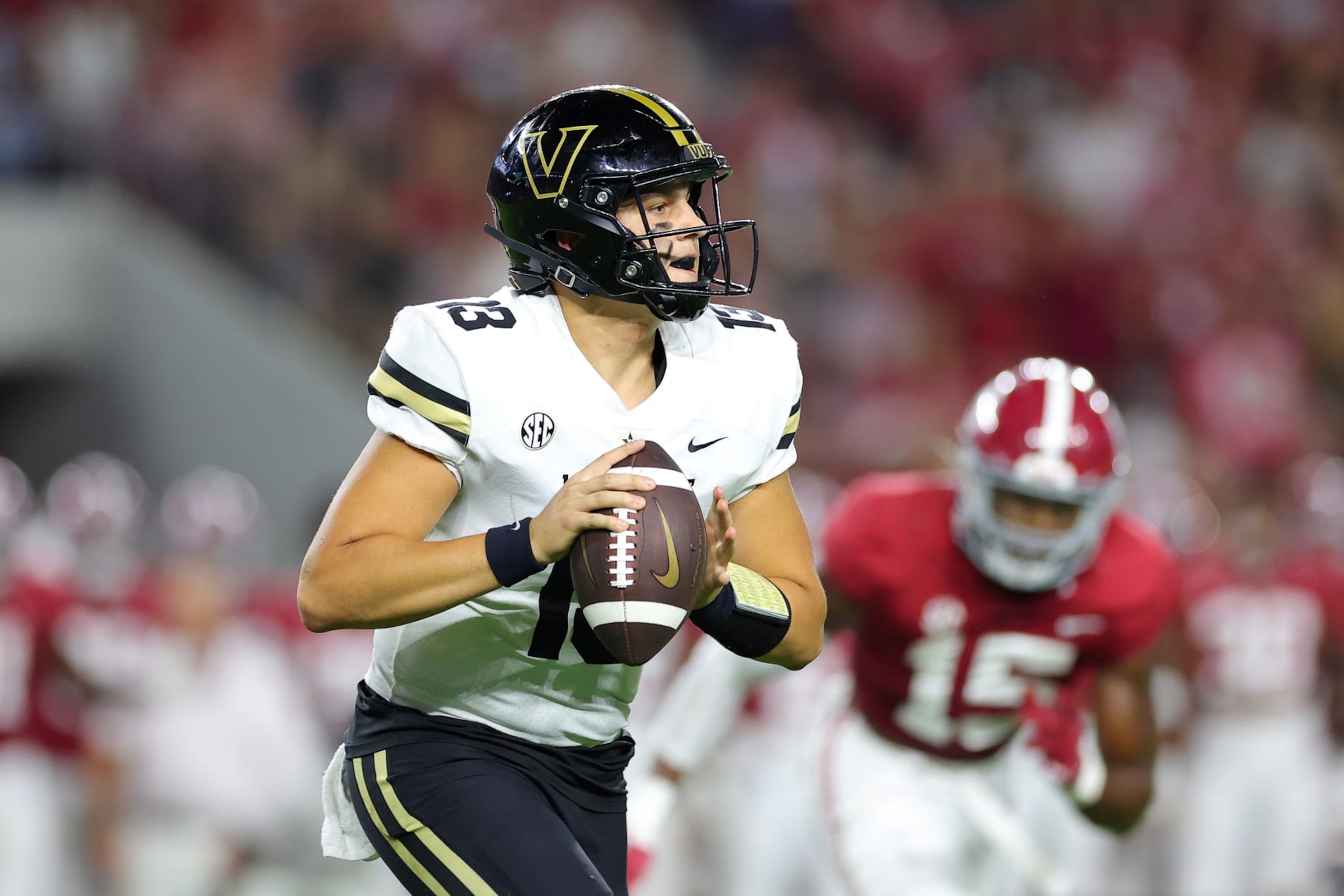 TUSCALOOSA, ALABAMA - SEPTEMBER 24: AJ Swann #13 of the Vanderbilt Commodores looks to pass against the Alabama Crimson Tide during the first half of the game at Bryant-Denny Stadium on September 24, 2022 in Tuscaloosa, Alabama. (Photo by Kevin C. Cox/Getty Images)