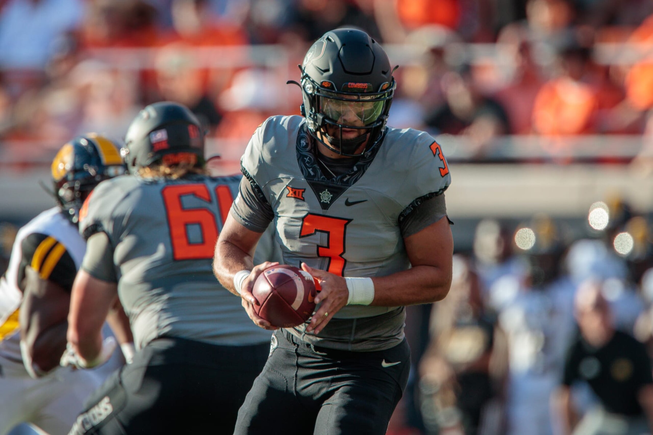 STILLWATER, OK - SEPTEMBER 17: Oklahoma State Cowboys quarterback Spencer Sanders (3) looks to hand off against the Arkansas-Pine Bluff Golden Lions on September 17th, 2022 at Boone Pickens Stadium in Stillwater, Oklahoma. (Photo by William Purnell/Icon Sportswire via Getty Images)