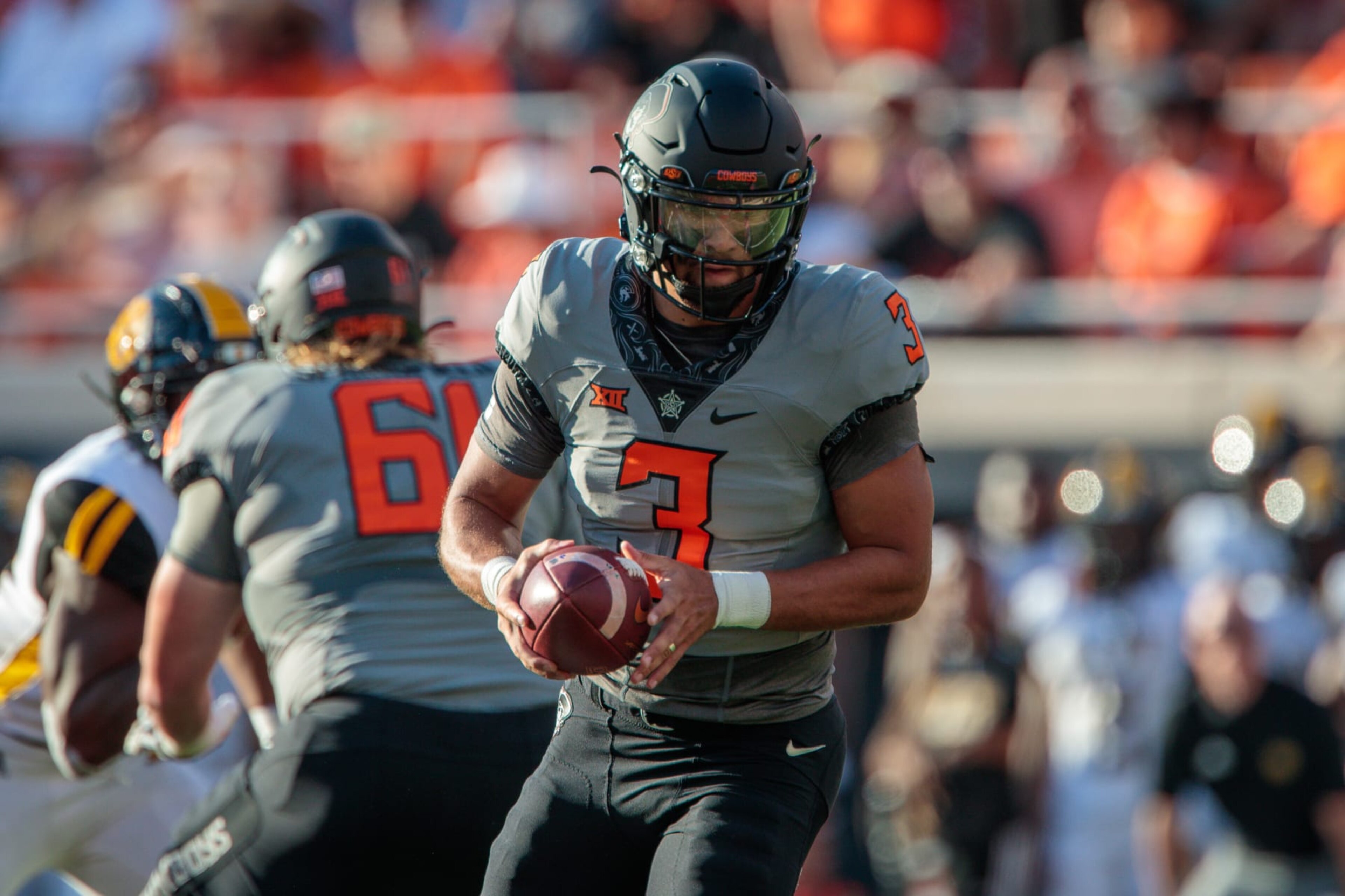 STILLWATER, OK - SEPTEMBER 17: Oklahoma State Cowboys quarterback Spencer Sanders (3) looks to hand off against the Arkansas-Pine Bluff Golden Lions on September 17th, 2022 at Boone Pickens Stadium in Stillwater, Oklahoma. (Photo by William Purnell/Icon Sportswire via Getty Images)
