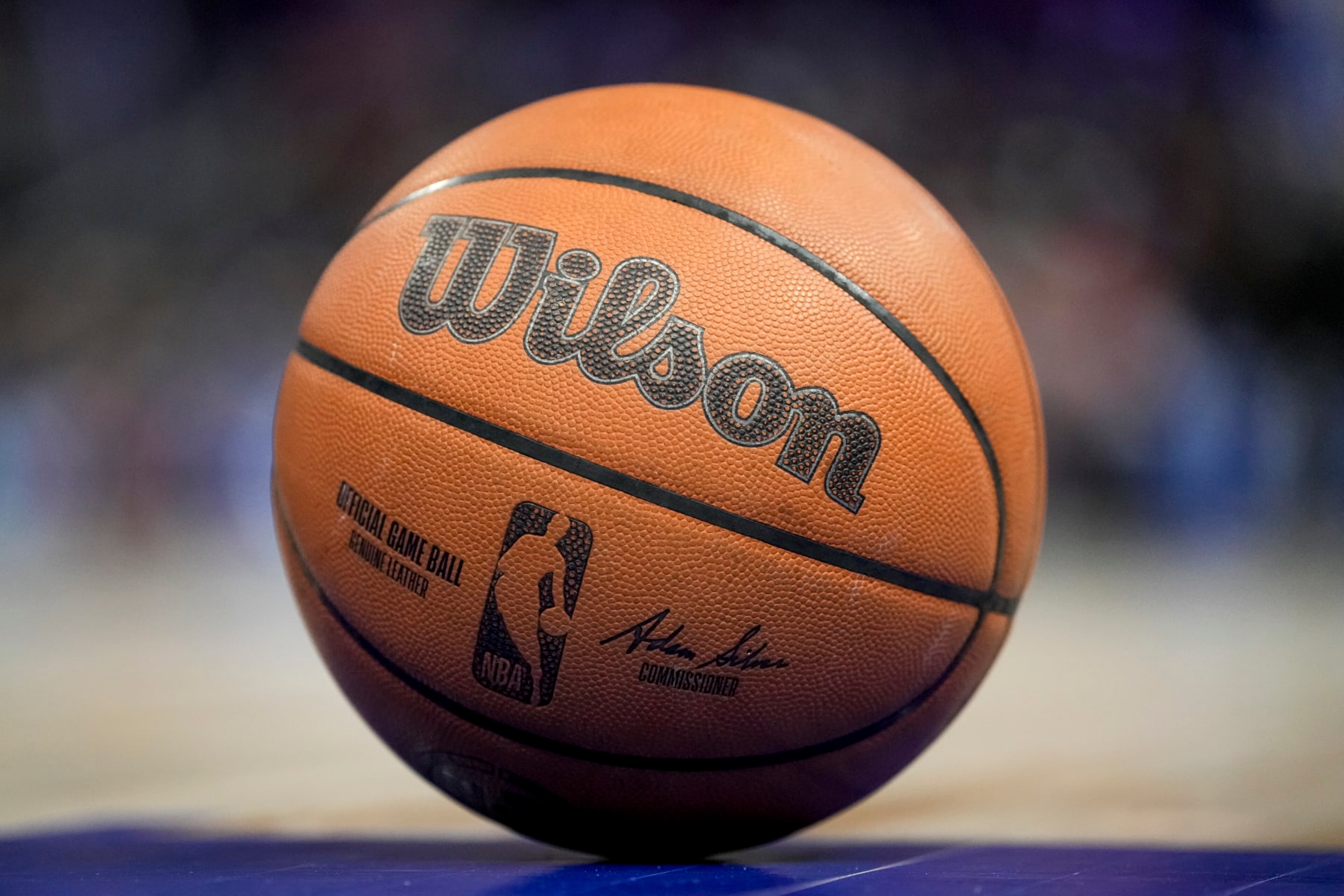 DETROIT, MICHIGAN - MARCH 31: The NBA logo is pictured on a Wilson brand basketball during the game between the Detroit Pistons and Philadelphia 76ers Little Caesars Arena on March 31, 2022 in Detroit, Michigan. NOTE TO USER: User expressly acknowledges and agrees that, by downloading and or using this photograph, User is consenting to the terms and conditions of the Getty Images License Agreement. (Photo by Nic Antaya/Getty Images) DETROIT, MICHIGAN - MARCH 31: The NBA logo is pictured on a Wilson brand basketball during the game between the Detroit Pistons and Philadelphia 76ers Little Caesars Arena on March 31, 2022 in Detroit, Michigan. NOTE TO USER: User expressly acknowledges and agrees that, by downloading and or using this photograph, User is consenting to the terms and conditions of the Getty Images License Agreement. (Photo by Nic Antaya/Getty Images)