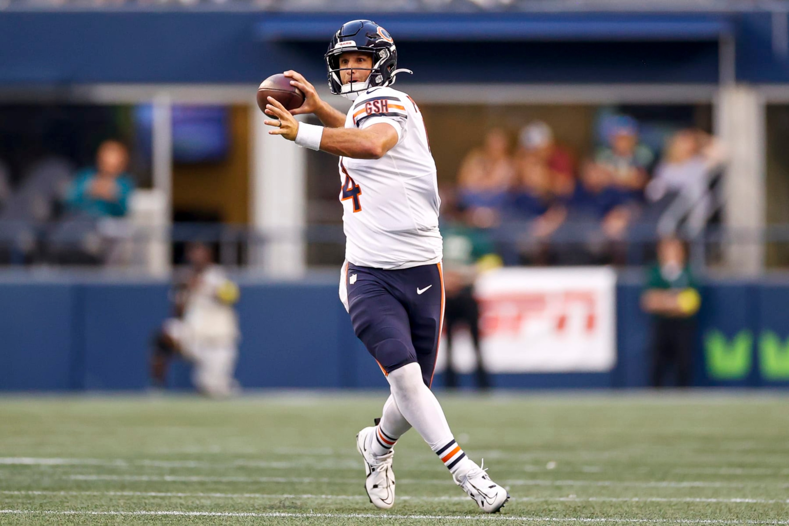 SEATTLE, WASHINGTON - AUGUST 18: Nathan Peterman #14 of the Chicago Bears throws a pass in the fourth quarter during the preseason game against the Seattle Seahawks at Lumen Field on August 18, 2022 in Seattle, Washington. (Photo by Steph Chambers/Getty Images)