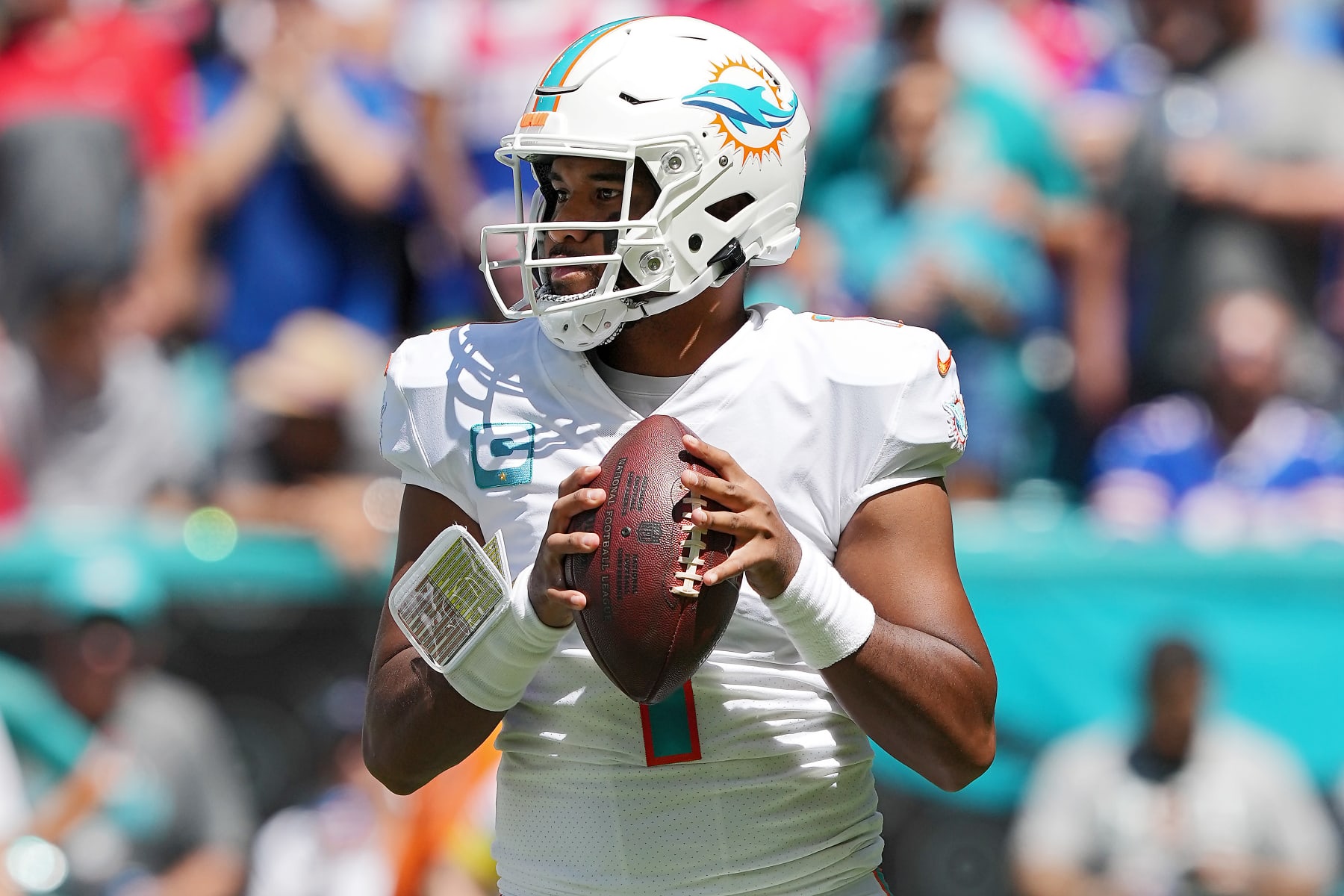 MIAMI GARDENS, FLORIDA - SEPTEMBER 25: Quarterback Tua Tagovailoa #1 of the Miami Dolphins looks to pass the ball during the first half of the game against the Buffalo Bills at Hard Rock Stadium on September 25, 2022 in Miami Gardens, Florida. (Photo by Eric Espada/Getty Images)