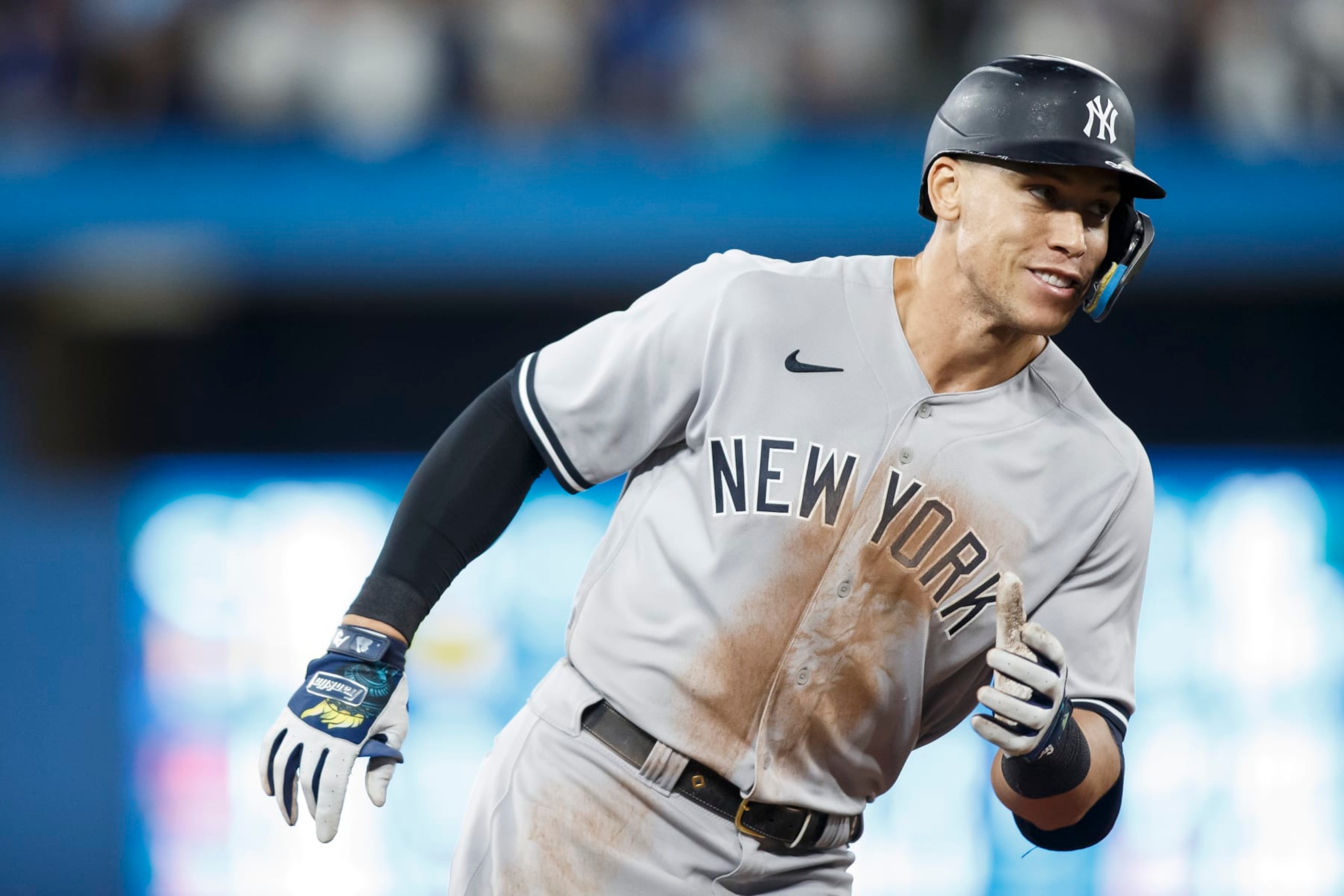 TORONTO, ON - SEPTEMBER 28: Aaron Judge #99 of the New York Yankees runs the bases as he hits his 61st home run of the season in the seventh inning against the Toronto Blue Jays at Rogers Centre on September 28, 2022 in Toronto, Ontario, Canada. Judge has now tied Roger Maris for the American League record. (Photo by Cole Burston/Getty Images) TORONTO, ON - SEPTEMBER 28: Aaron Judge #99 of the New York Yankees runs the bases as he hits his 61st home run of the season in the seventh inning against the Toronto Blue Jays at Rogers Centre on September 28, 2022 in Toronto, Ontario, Canada. Judge has now tied Roger Maris for the American League record. (Photo by Cole Burston/Getty Images)