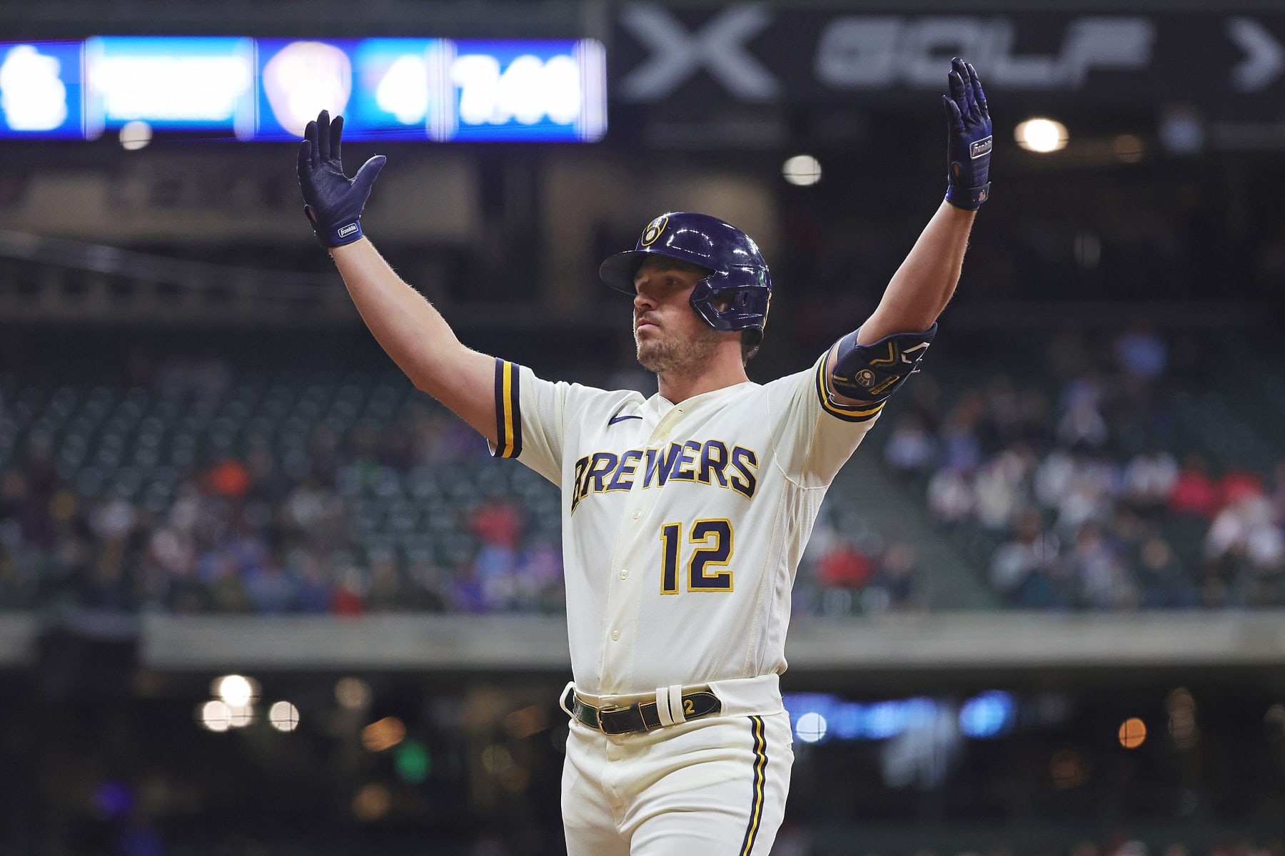 MILWAUKEE, WISCONSIN - SEPTEMBER 28: Hunter Renfroe #12 of the Milwaukee Brewers reacts to an RBI single against the St. Louis Cardinals during the third inning at American Family Field on September 28, 2022 in Milwaukee, Wisconsin. (Photo by Stacy Revere/Getty Images)