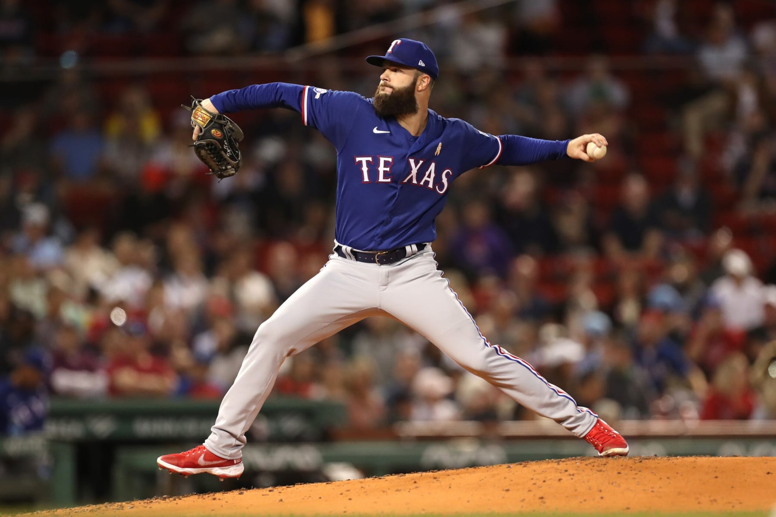 BOSTON, MASSACHUSETTS - SEPTEMBER 02: Dallas Keuchel #60 of the Texas Rangers delivers a pitch during the second inning against the Boston Red Sox at Fenway Park on September 02, 2022 in Boston, Massachusetts. (Photo by Paul Rutherford/Getty Images)