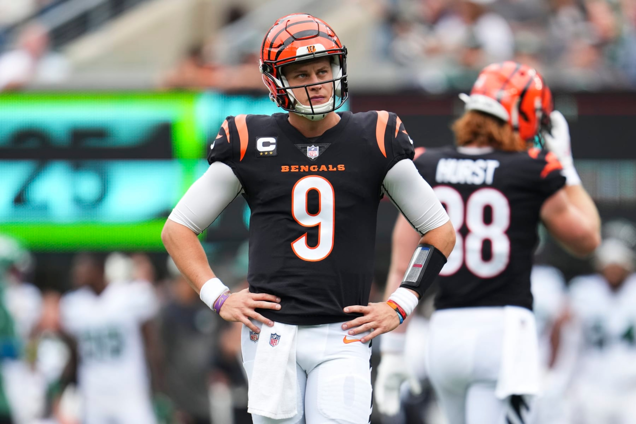 EAST RUTHERFORD, NJ - SEPTEMBER 25: Joe Burrow #9 of the Cincinnati Bengals looks down field against the New York Jets at MetLife Stadium on September 25, 2022 in East Rutherford, New Jersey. (Photo by Cooper Neill/Getty Images)