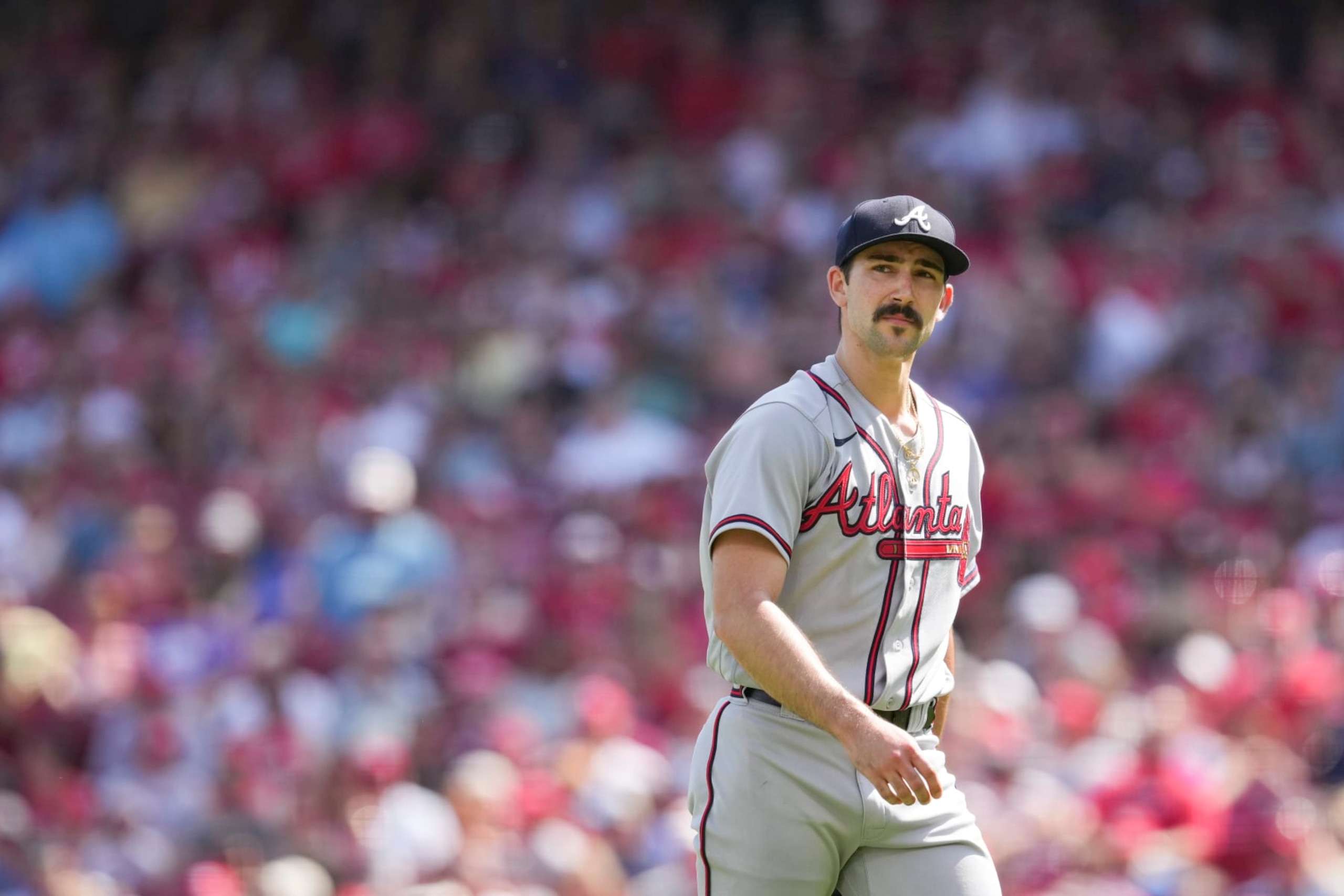 Atlanta Braves starting pitcher Spencer Strider (65) plays during the first inning of the team's baseball game against the Cincinnati Reds Saturday, July 2, 2022, in Cincinnati. (AP Photo/Jeff Dean)