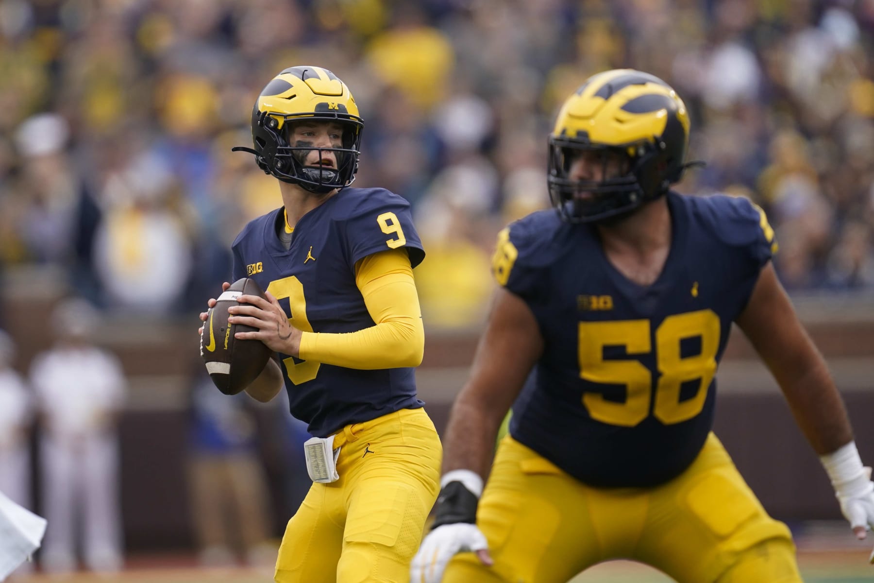 Michigan quarterback J.J. McCarthy (9) looks to throw against Maryland in the second half of an NCAA college football game in Ann Arbor, Mich., Saturday, Sept. 24, 2022. (AP Photo/Paul Sancya)