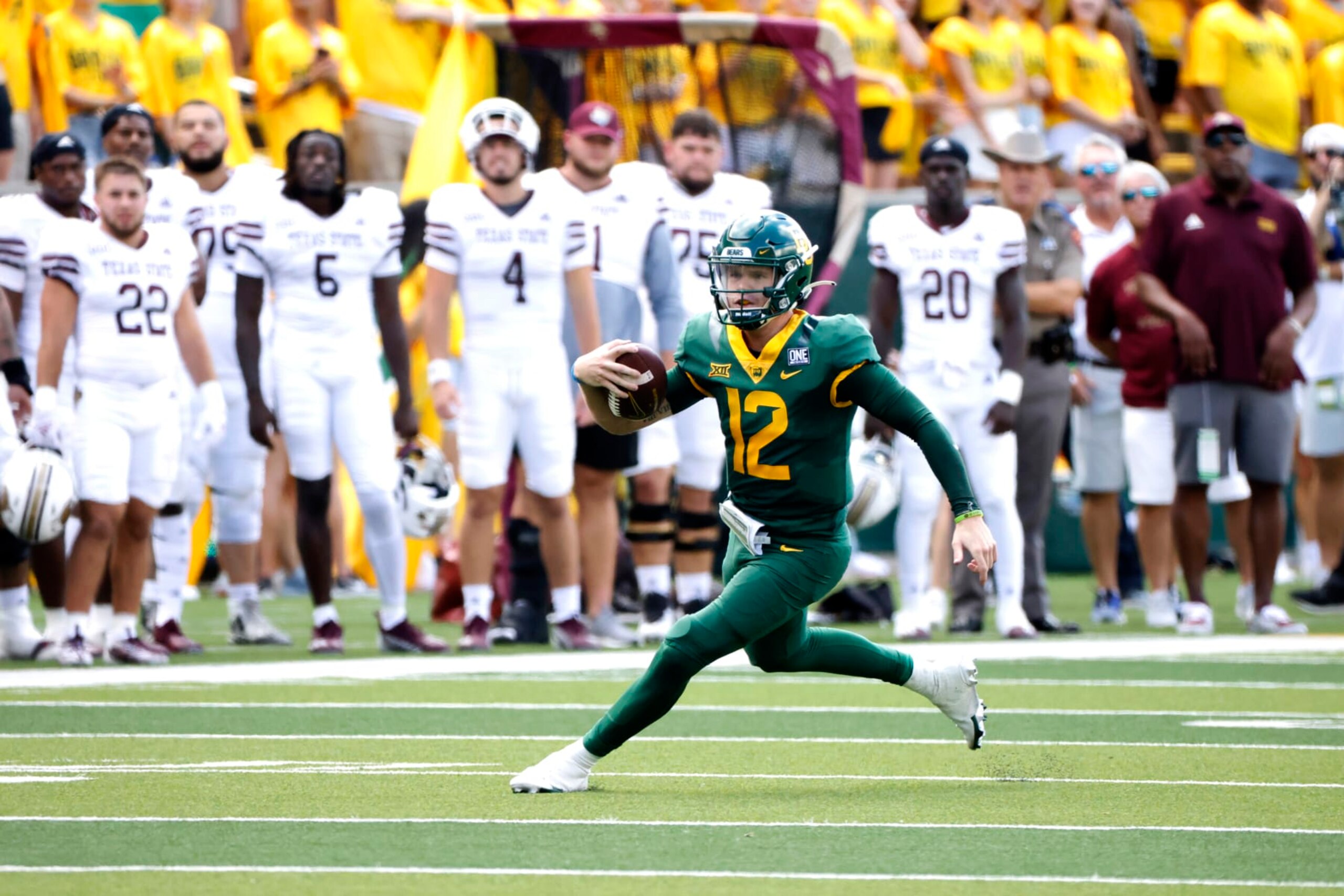 WACO, TX - SEPTEMBER 17: Blake Shapen #12 of the Baylor Bears runs the ball against the Texas State Bobcats in the first half at McLane Stadium on September 17, 2022 in Waco, Texas. (Photo by Ron Jenkins/Getty Images)
