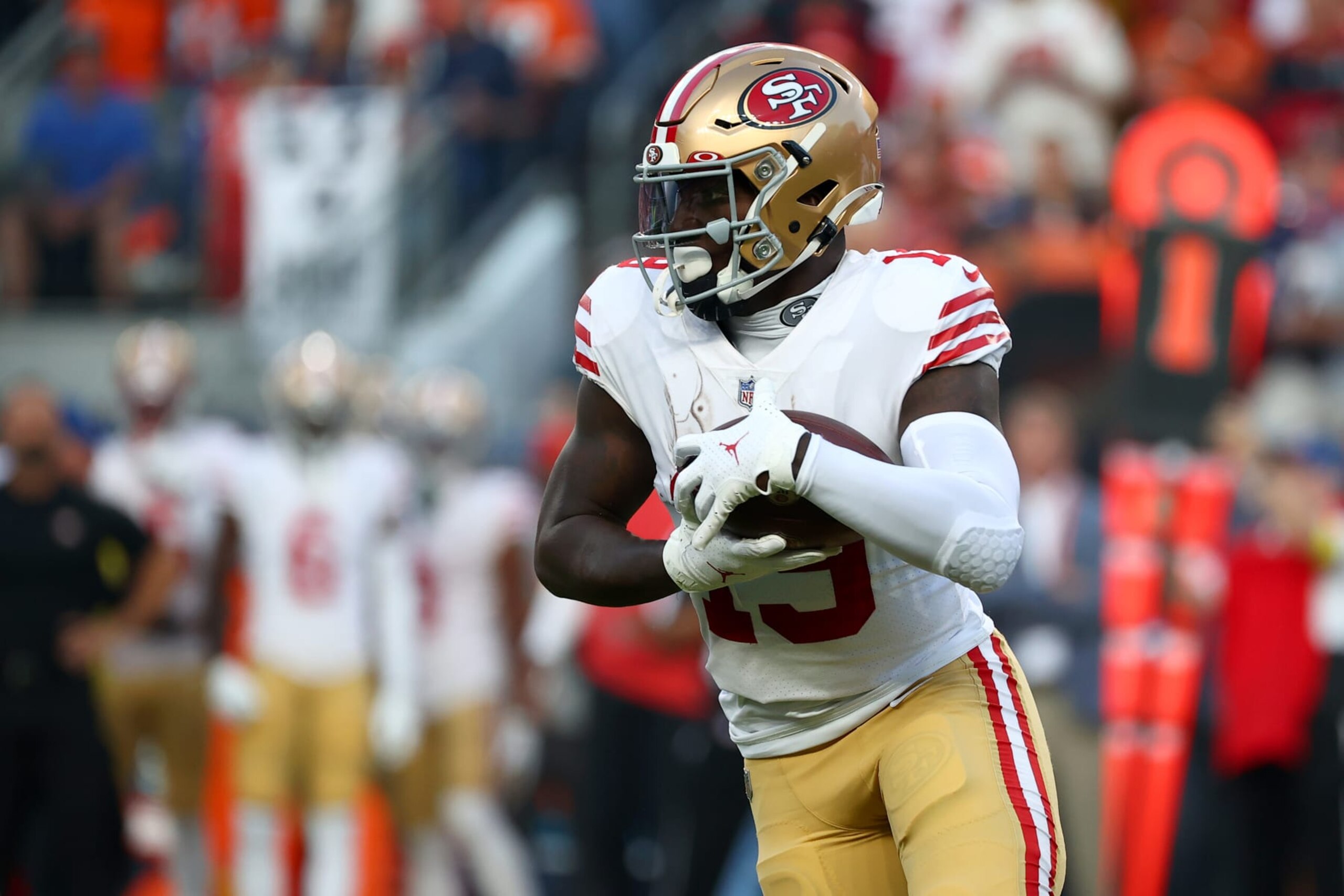 DENVER, CO - SEPTEMBER 25: Deebo Samuel #19 of the San Francisco 49ers makes a reception against the Denver Broncos at Empower Field At Mile High on September 25, 2022 in Denver, Colorado. (Photo by Jamie Schwaberow/Getty Images)