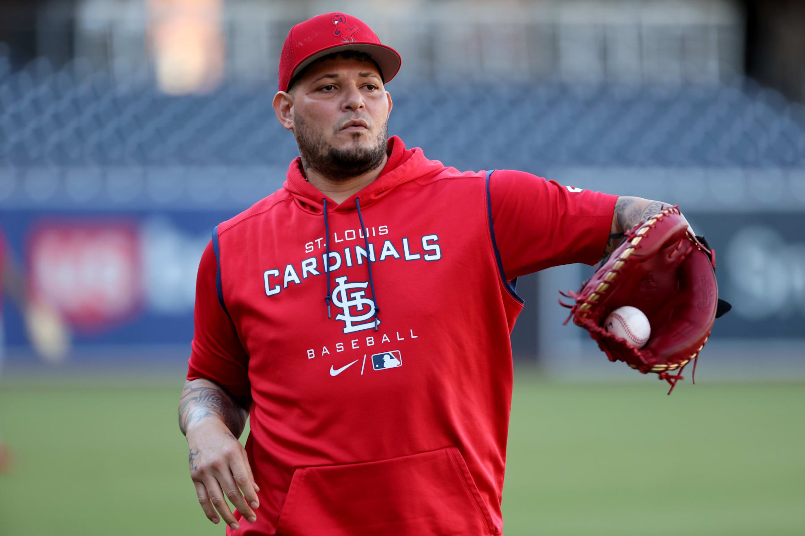 SAN DIEGO, CA - SEPTEMBER 20:  St. Louis Cardinals catcher Yadier Molina (4) plays a catch with designated hitter Albert Pujols (5) before the game against the San Diego Padres on September 20, 2022, at Petco Park in San Diego, CA. (Photo by Kiyoshi Mio/Icon Sportswire via Getty Images)