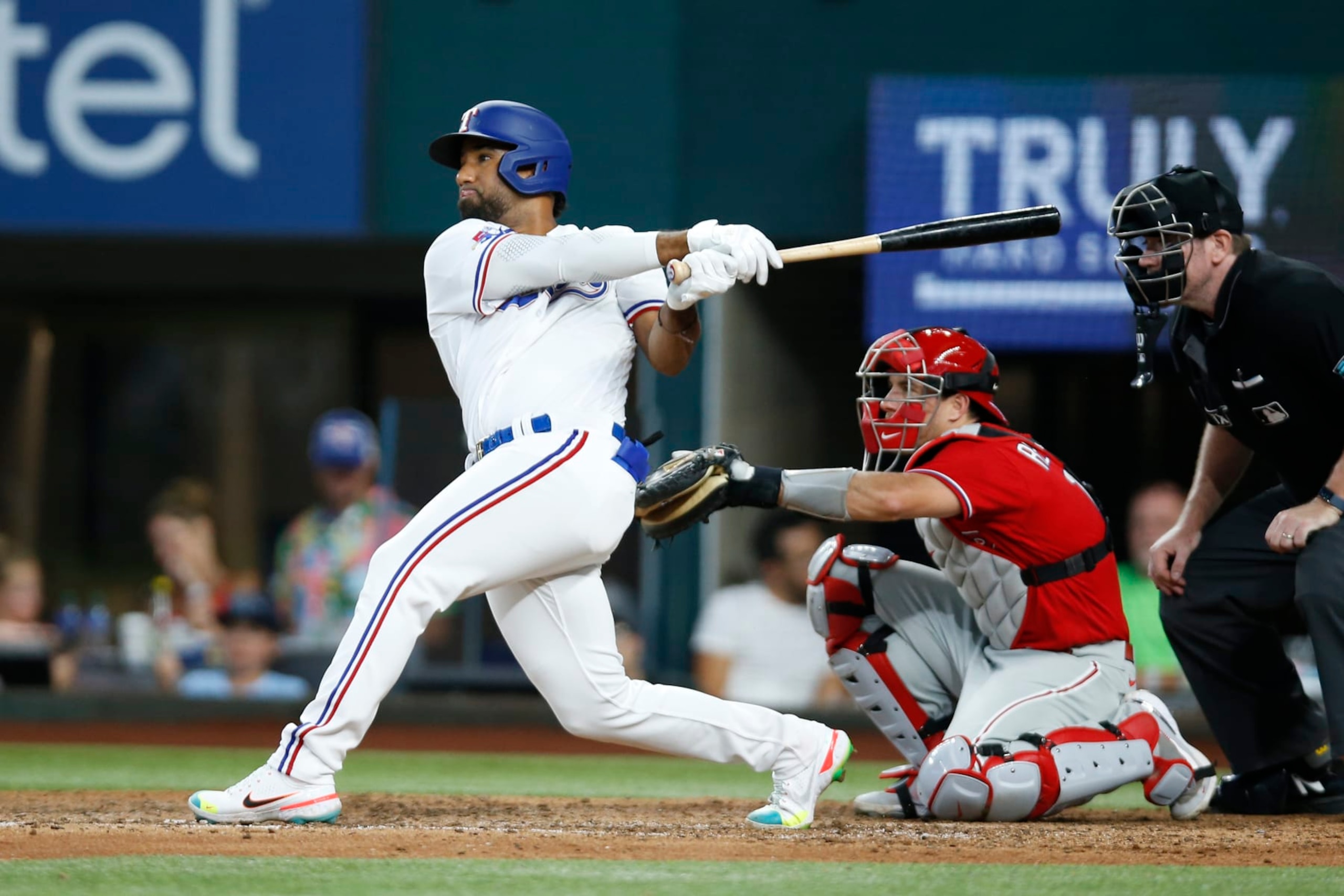 ARLINGTON, TEXAS - JUNE 22: Ezequiel Duran #70 of the Texas Rangersof the Texas Rangers bats in the game against the Philadelphia Phillies at Globe Life Field on June 22, 2022 in Arlington, Texas. (Photo by Tim Heitman/Getty Images)