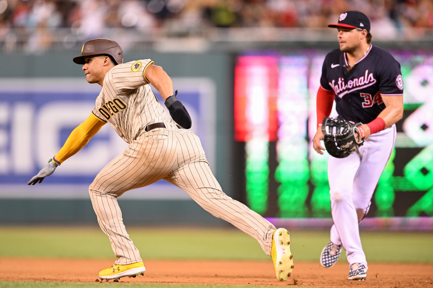 WASHINGTON, DC - AUGUST 12, 2022: Juan Soto #22 of the San Diego Padres takes a lead at first base during the fifth inning against the Washington Nationals at Nationals Park on August 12, 2022 in Washington, DC. (Photo by Chris Bernacchi/Diamond Images via Getty Images)