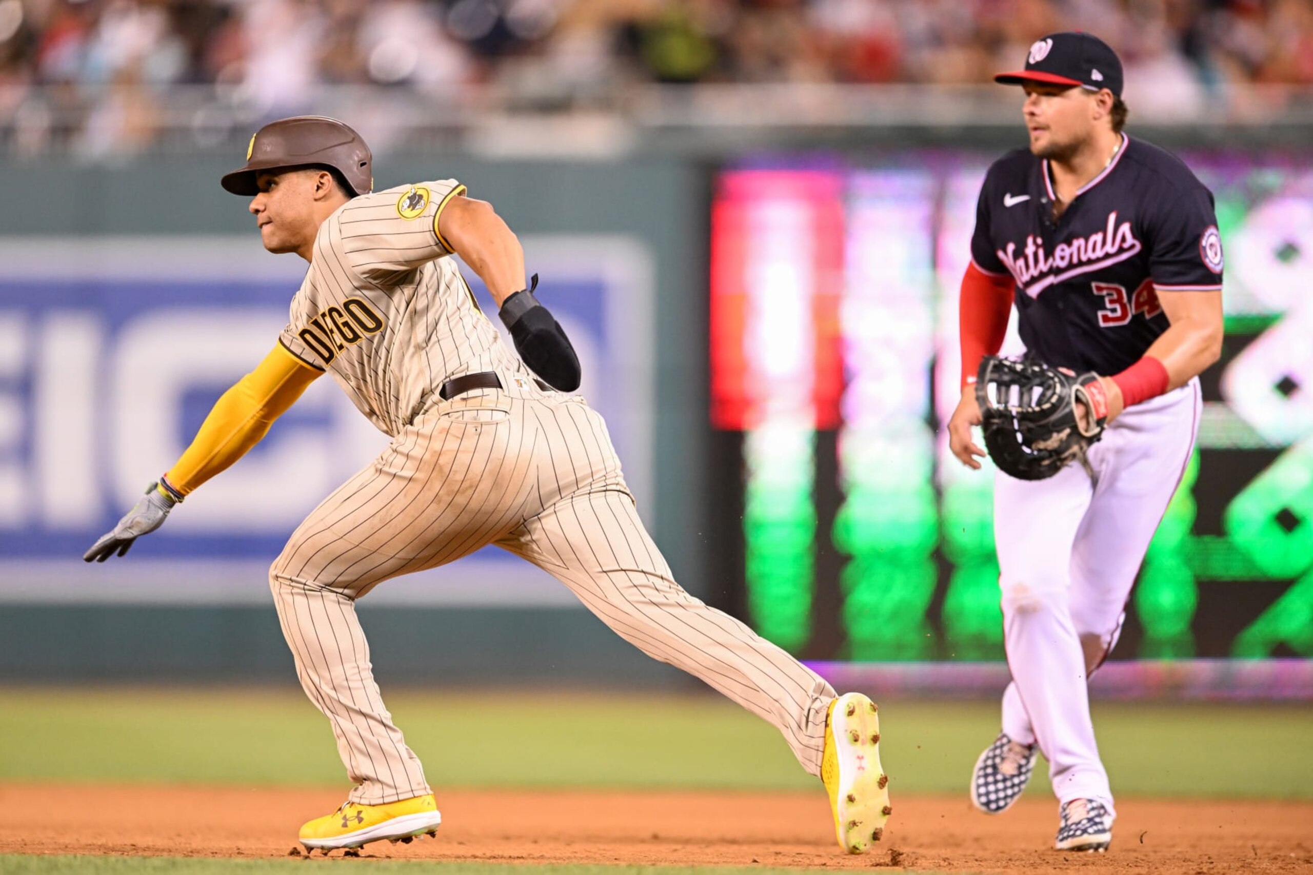 WASHINGTON, DC - AUGUST 12, 2022: Juan Soto #22 of the San Diego Padres takes a lead at first base during the fifth inning against the Washington Nationals at Nationals Park on August 12, 2022 in Washington, DC. (Photo by Chris Bernacchi/Diamond Images via Getty Images)