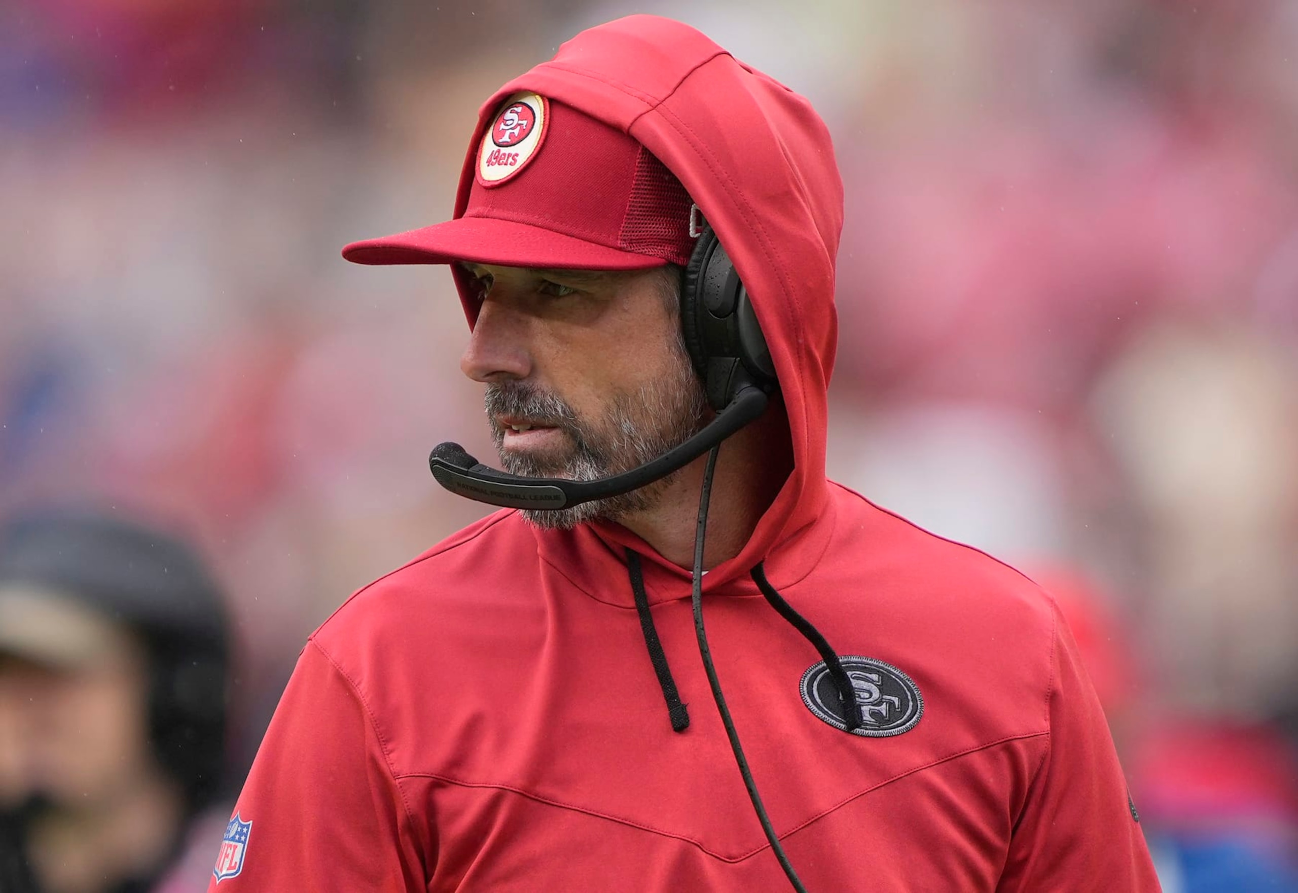 SANTA CLARA, CALIFORNIA - SEPTEMBER 18: Head coach Kyle Shanahan of the San Francisco 49ers looks on during the fourth quarter of their game against the Seattle Seahawks at Levi's Stadium on September 18, 2022 in Santa Clara, California. (Photo by Thearon W. Henderson/Getty Images) SANTA CLARA, CALIFORNIA - SEPTEMBER 18: Head coach Kyle Shanahan of the San Francisco 49ers looks on during the fourth quarter of their game against the Seattle Seahawks at Levi's Stadium on September 18, 2022 in Santa Clara, California. (Photo by Thearon W. Henderson/Getty Images)