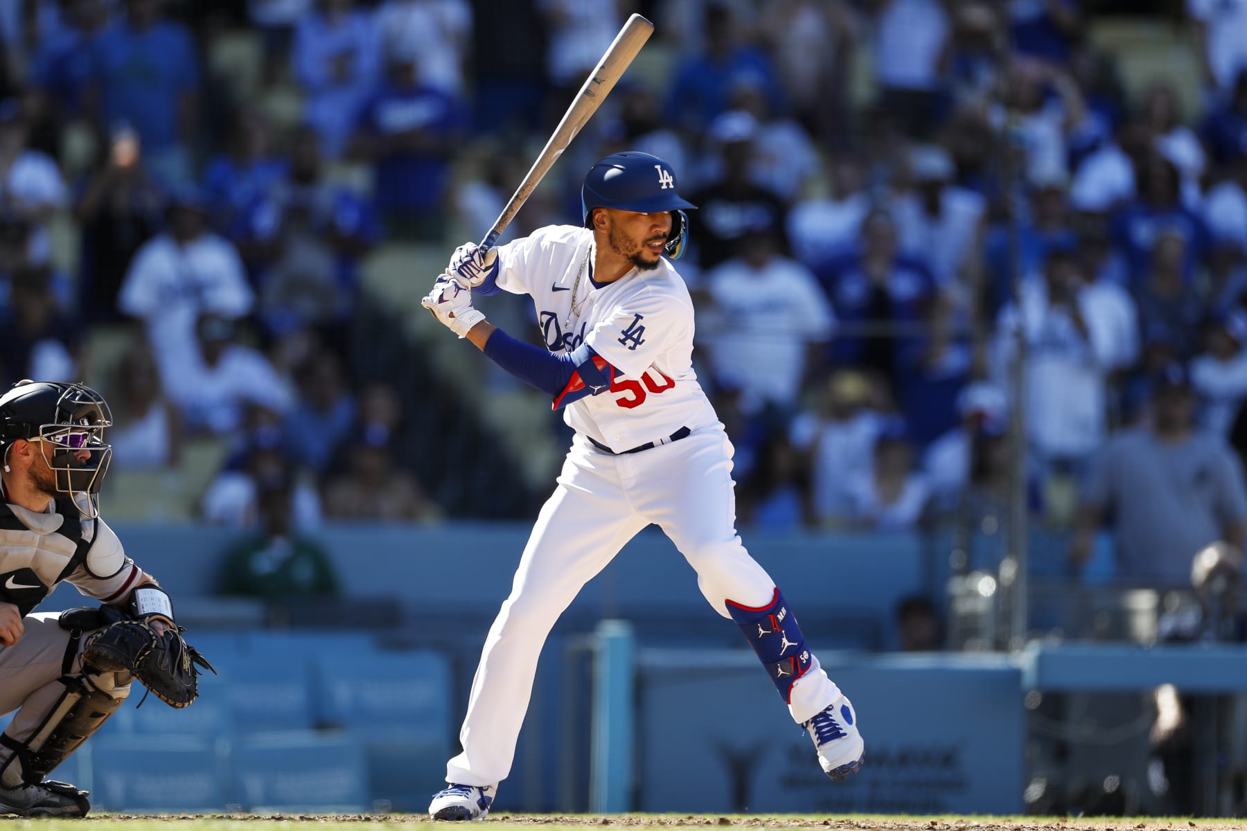 LOS ANGELES, CA - SEPTEMBER 20: Los Angeles Dodgers right fielder Mookie Betts (50) bats during game 1 of a doubleheader against the Arizona Diamondbacks on September 20, 2022, at Dodger Stadium in Los Angeles, CA. (Photo by Brandon Sloter/Icon Sportswire via Getty Images)