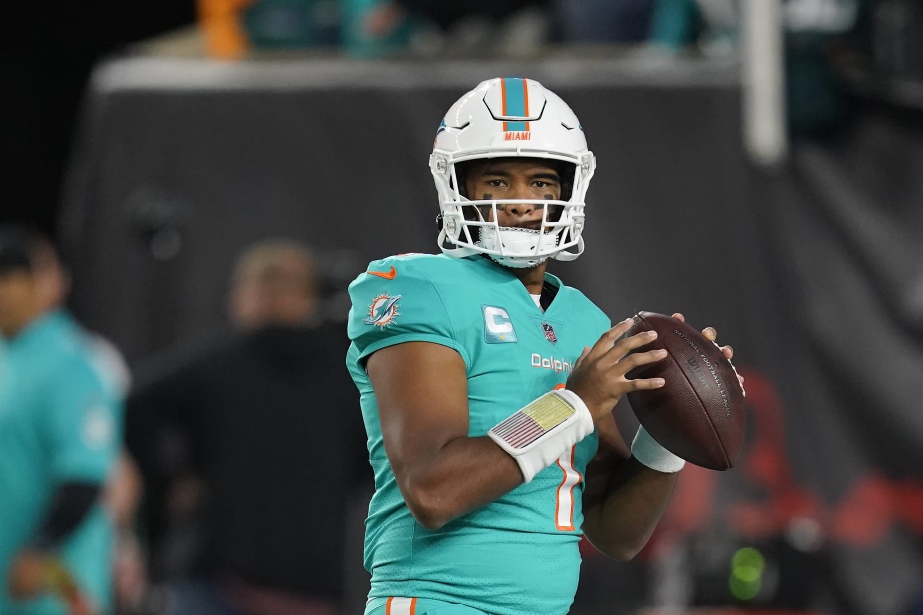 Miami Dolphins quarterback Tua Tagovailoa throws before an NFL football game against the Cincinnati Bengals, Thursday, Sept. 29, 2022, in Cincinnati. (AP Photo/Joshua A. Bickel)