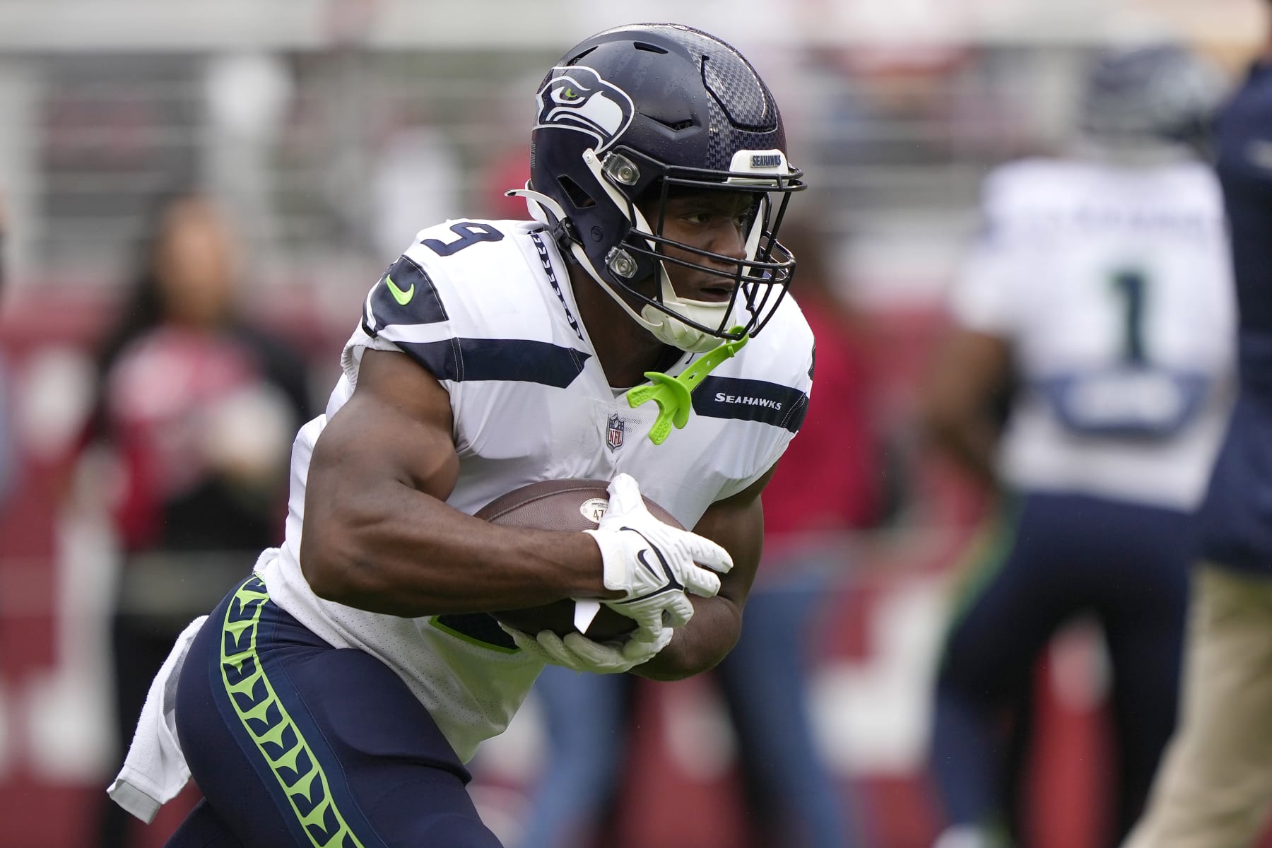 SANTA CLARA, CALIFORNIA - SEPTEMBER 18: Kenneth Walker III #9 of the Seattle Seahawks runs with the ball during warmups before the game against the San Francisco 49ers at Levi's Stadium on September 18, 2022 in Santa Clara, California. (Photo by Thearon W. Henderson/Getty Images)
