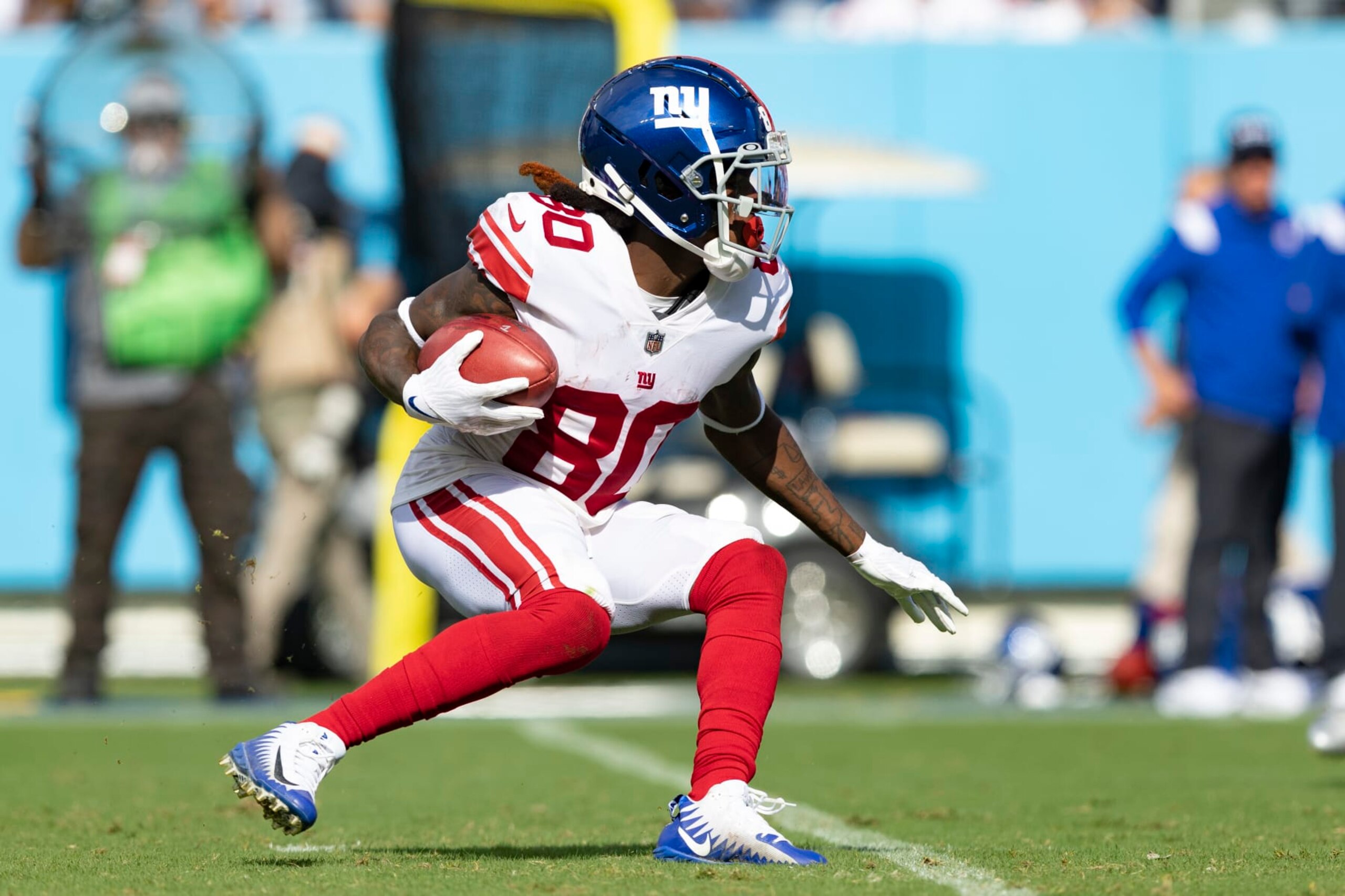 NASHVILLE, TENNESSEE - SEPTEMBER 11: Richie James #80 of the New York Giants runs the ball during a game against the Tennessee Titans at Nissan Stadium on September 11, 2022 in Nashville, Tennessee. The Giants defeated the Titans 21-20.  (Photo by Wesley Hitt/Getty Images)