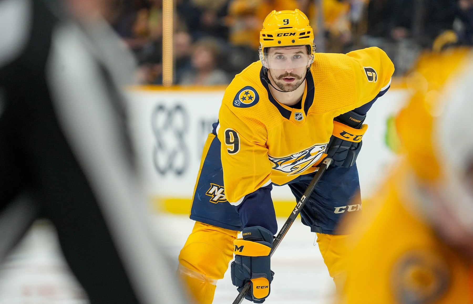 NASHVILLE, TN - APRIL 26: Filip Forsberg #9 of the Nashville Predators prepares for a face-off against the Calgary Flames during an NHL game at Bridgestone Arena on April 26, 2022 in Nashville, Tennessee. (Photo by John Russell/NHLI via Getty Images)