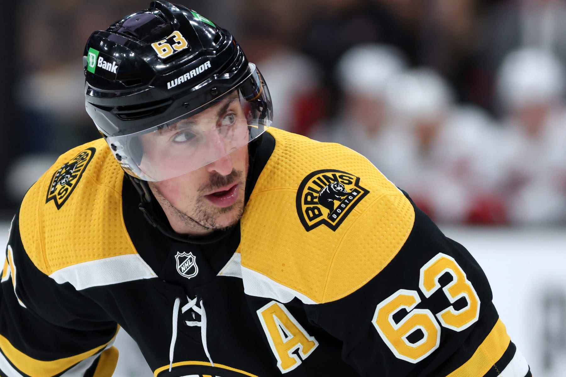 BOSTON, MASSACHUSETTS - MAY 06: Brad Marchand #63 of the Boston Bruins looks on during the first period Game Three of the First Round of the 2022 Stanley Cup Playoffs against the Carolina Hurricanes at TD Garden on May 06, 2022 in Boston, Massachusetts. (Photo by Maddie Meyer/Getty Images)