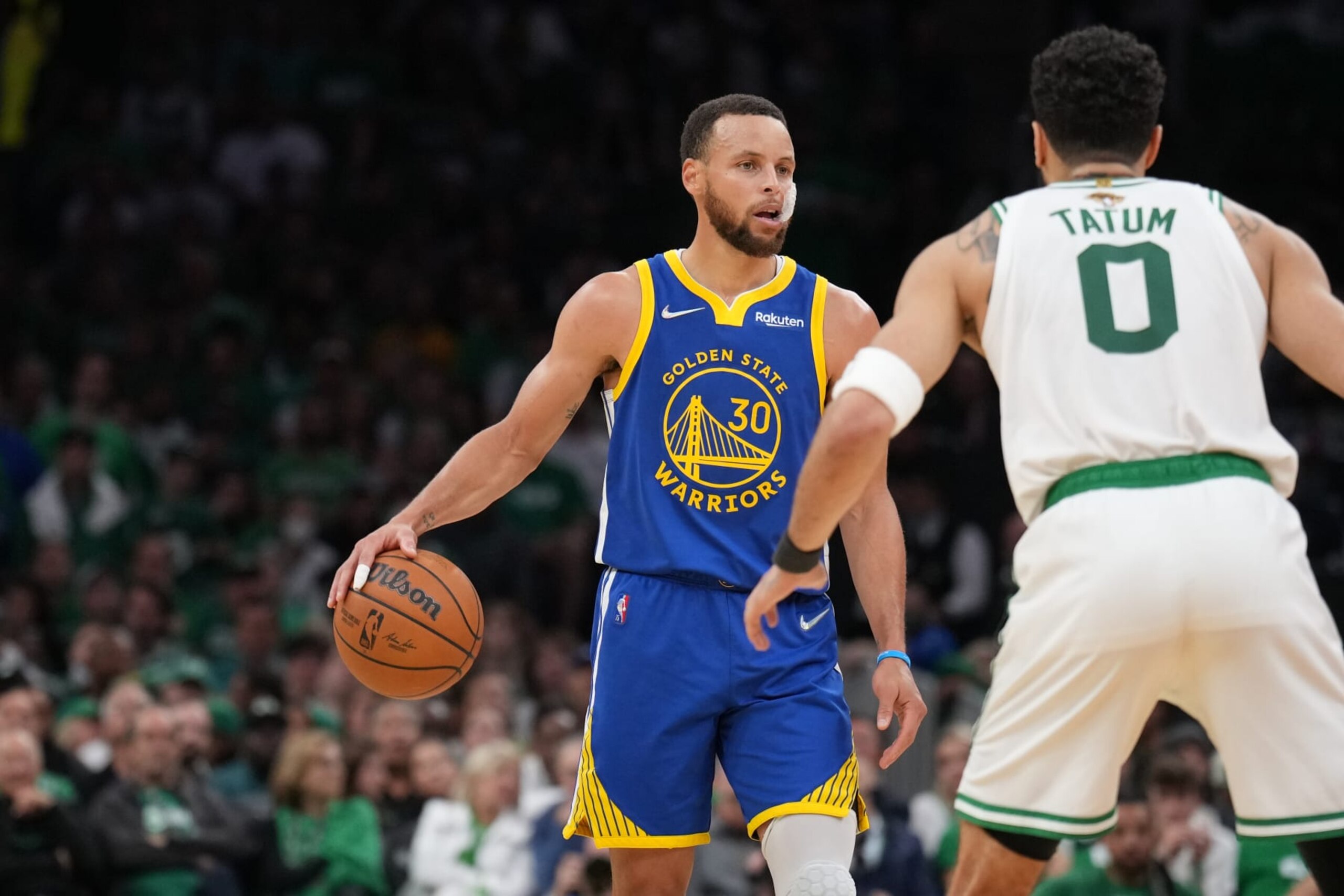 BOSTON, MA - JUNE 16: Jayson Tatum #0 of the Boston Celtics plays defense on Stephen Curry #30 of the Golden State Warriors during Game Six of the 2022 NBA Finals on June 16, 2022 at TD Garden in Boston, Massachusetts. NOTE TO USER: User expressly acknowledges and agrees that, by downloading and or using this photograph, user is consenting to the terms and conditions of Getty Images License Agreement. Mandatory Copyright Notice: Copyright 2022 NBAE (Photo by Jesse D. Garrabrant/NBAE via Getty Images)