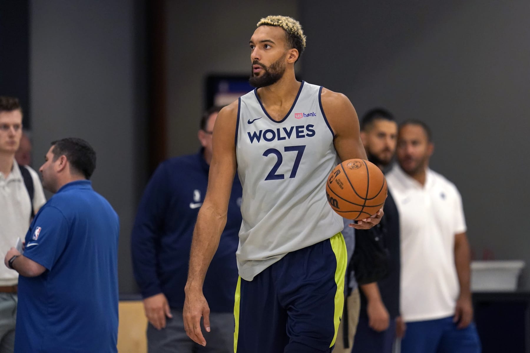 Minnesota Timberwolves center Rudy Gobert takes part in drills during the NBA basketball team's training camp, Tuesday, Sept. 27, 2022, in Minneapolis. (AP Photo/Abbie Parr)