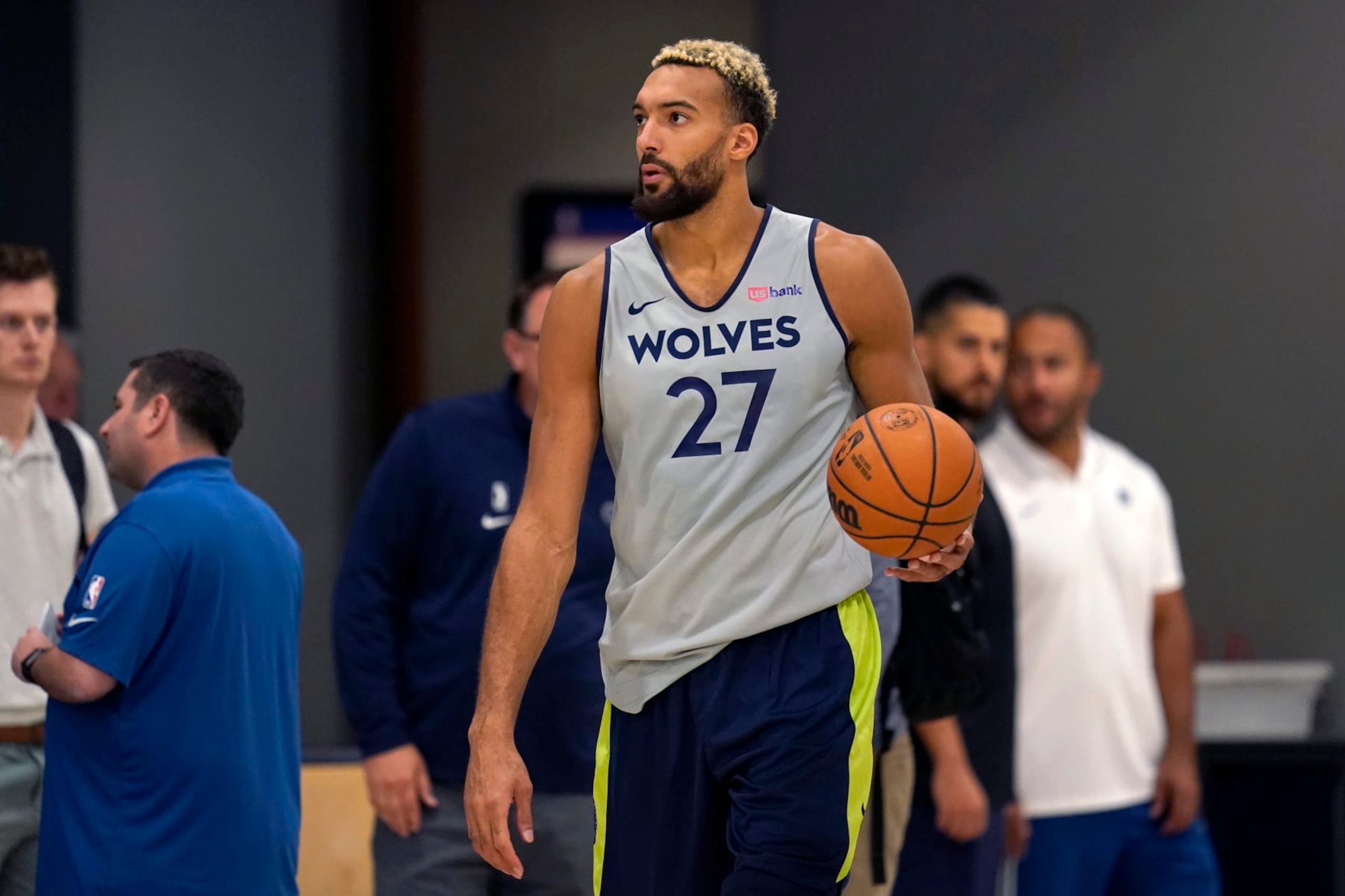 Minnesota Timberwolves center Rudy Gobert takes part in drills during the NBA basketball team's training camp, Tuesday, Sept. 27, 2022, in Minneapolis. (AP Photo/Abbie Parr)