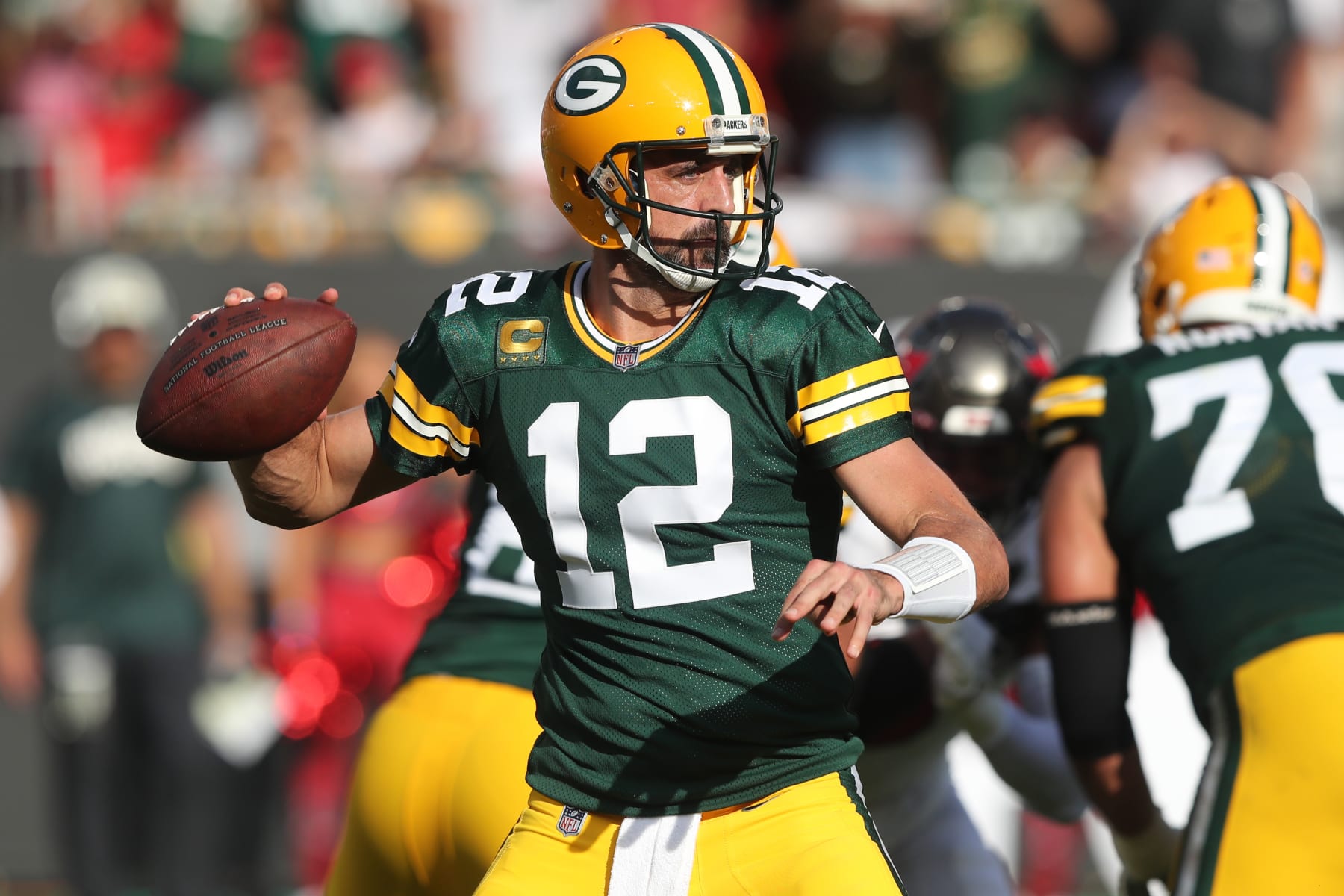 TAMPA, FL - SEPTEMBER 25: Green Bay Packers Quarterback Aaron Rodgers (12) looks for an open receiver during the regular season game between the Green Bay Packers and the Tampa Bay Buccaneers on September 25, 2022 at Raymond James Stadium in Tampa, Florida. (Photo by Cliff Welch/Icon Sportswire via Getty Images)