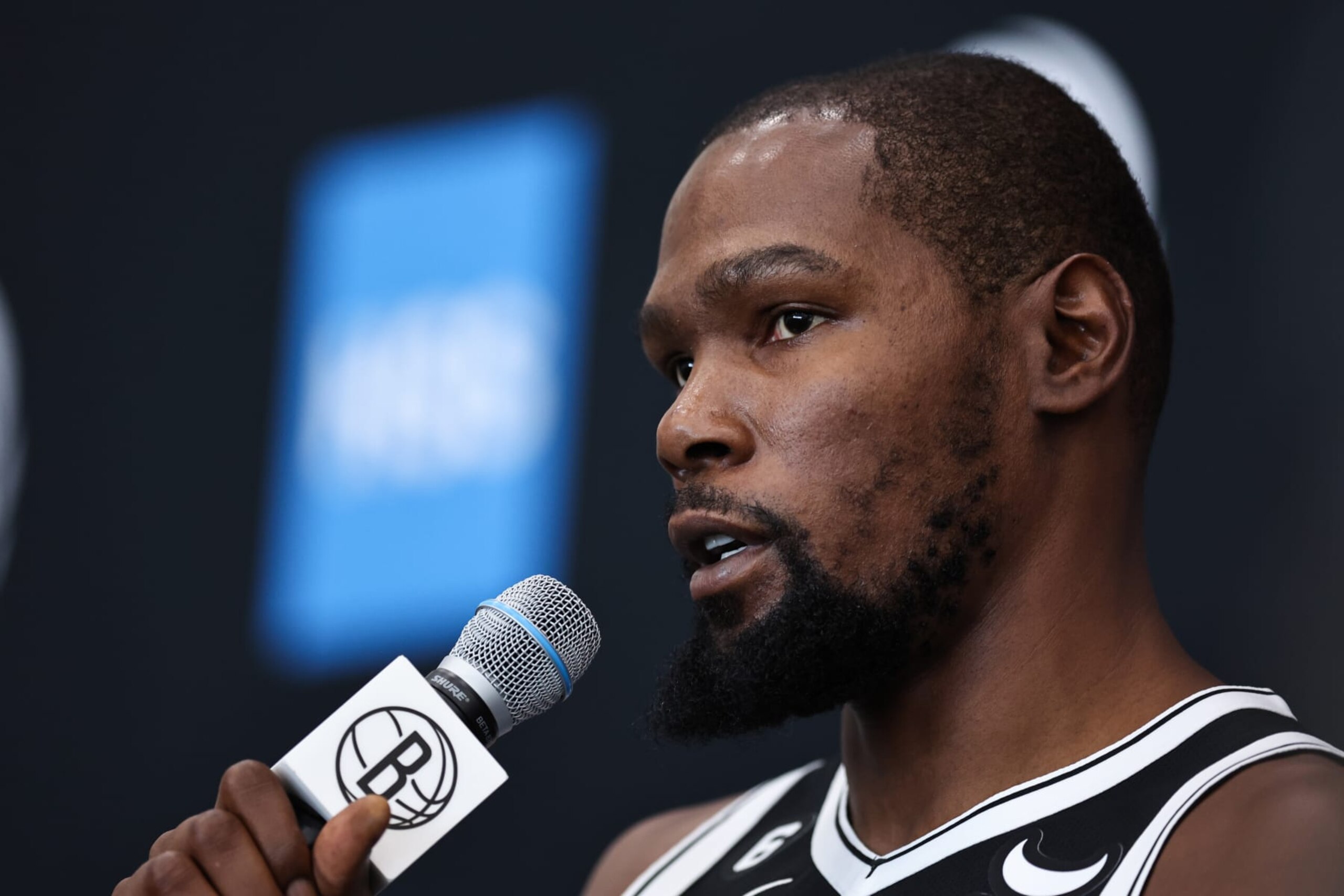 NEW YORK, NEW YORK - SEPTEMBER 26: Kevin Durant #7 of the Brooklyn Nets speaks during a press conference at Brooklyn Nets Media Day at HSS Training Center on September 26, 2022 in the Brooklyn borough of New York City. NOTE TO USER: User expressly acknowledges and agrees that, by downloading and/or using this photograph, User is consenting to the terms and conditions of the Getty Images License Agreement. (Photo by Dustin Satloff/Getty Images) NEW YORK, NEW YORK - SEPTEMBER 26: Kevin Durant #7 of the Brooklyn Nets speaks during a press conference at Brooklyn Nets Media Day at HSS Training Center on September 26, 2022 in the Brooklyn borough of New York City. NOTE TO USER: User expressly acknowledges and agrees that, by downloading and/or using this photograph, User is consenting to the terms and conditions of the Getty Images License Agreement. (Photo by Dustin Satloff/Getty Images)