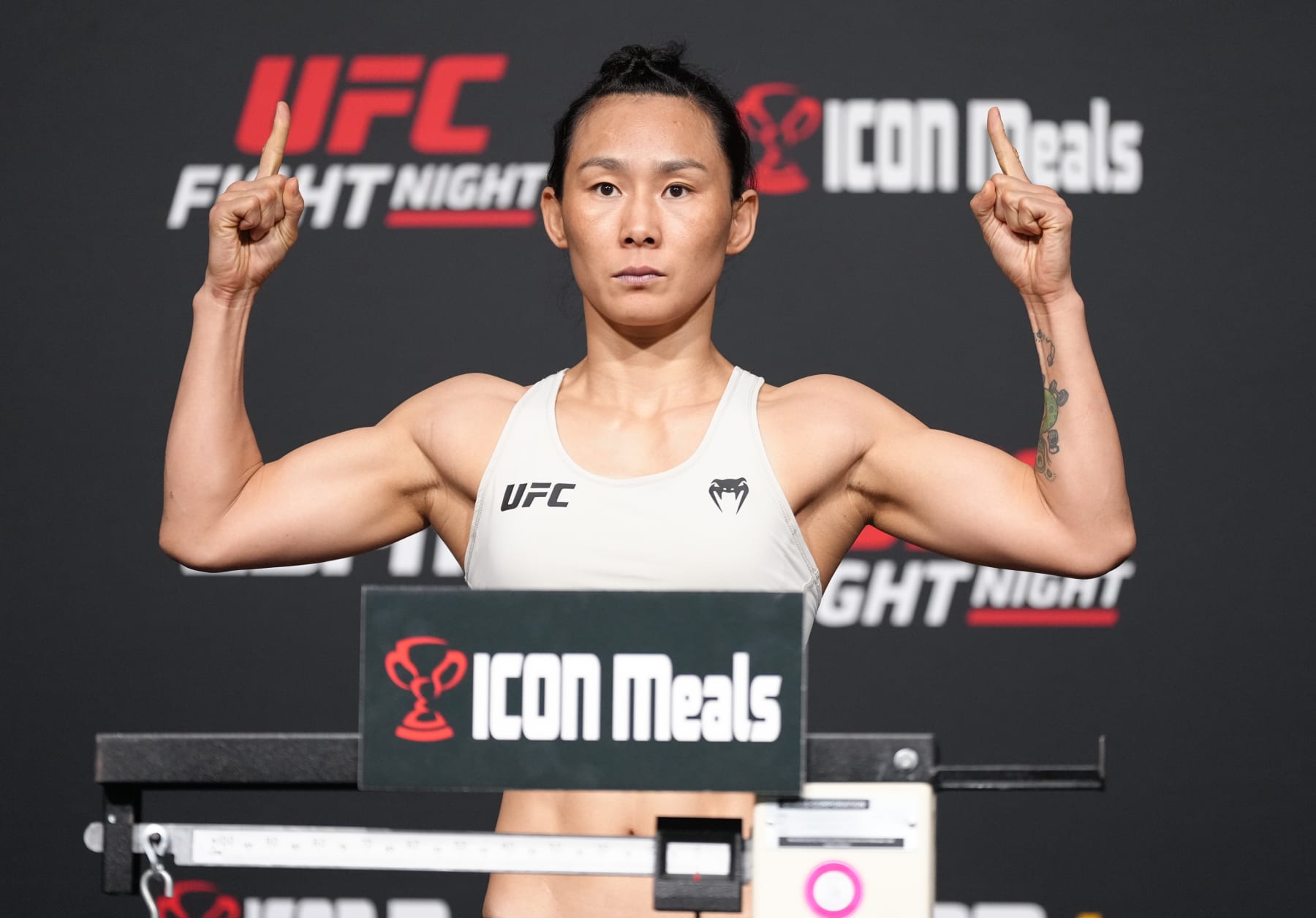 LAS VEGAS, NEVADA - SEPTEMBER 30: Yan Xiaonan of China poses on the scale during the UFC weigh-in at UFC APEX on September 30, 2022 in Las Vegas, Nevada. (Photo by Jeff Bottari/Zuffa LLC)