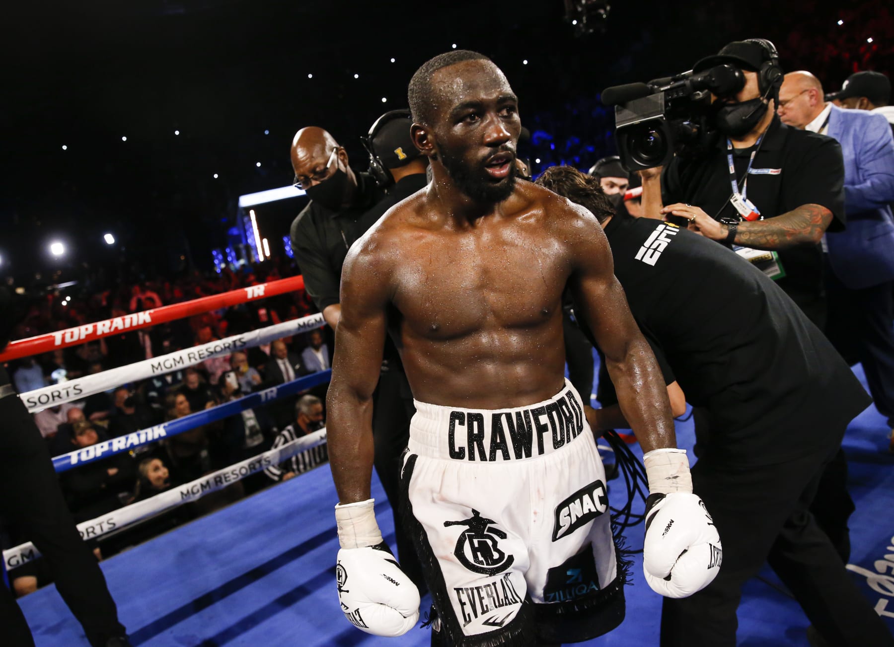 Terence Crawford looks on after defeating Shawn Porter via TKO in a welterweight title boxing match Saturday, Nov. 20, 2021, in Las Vegas. (AP Photo/Chase Stevens)