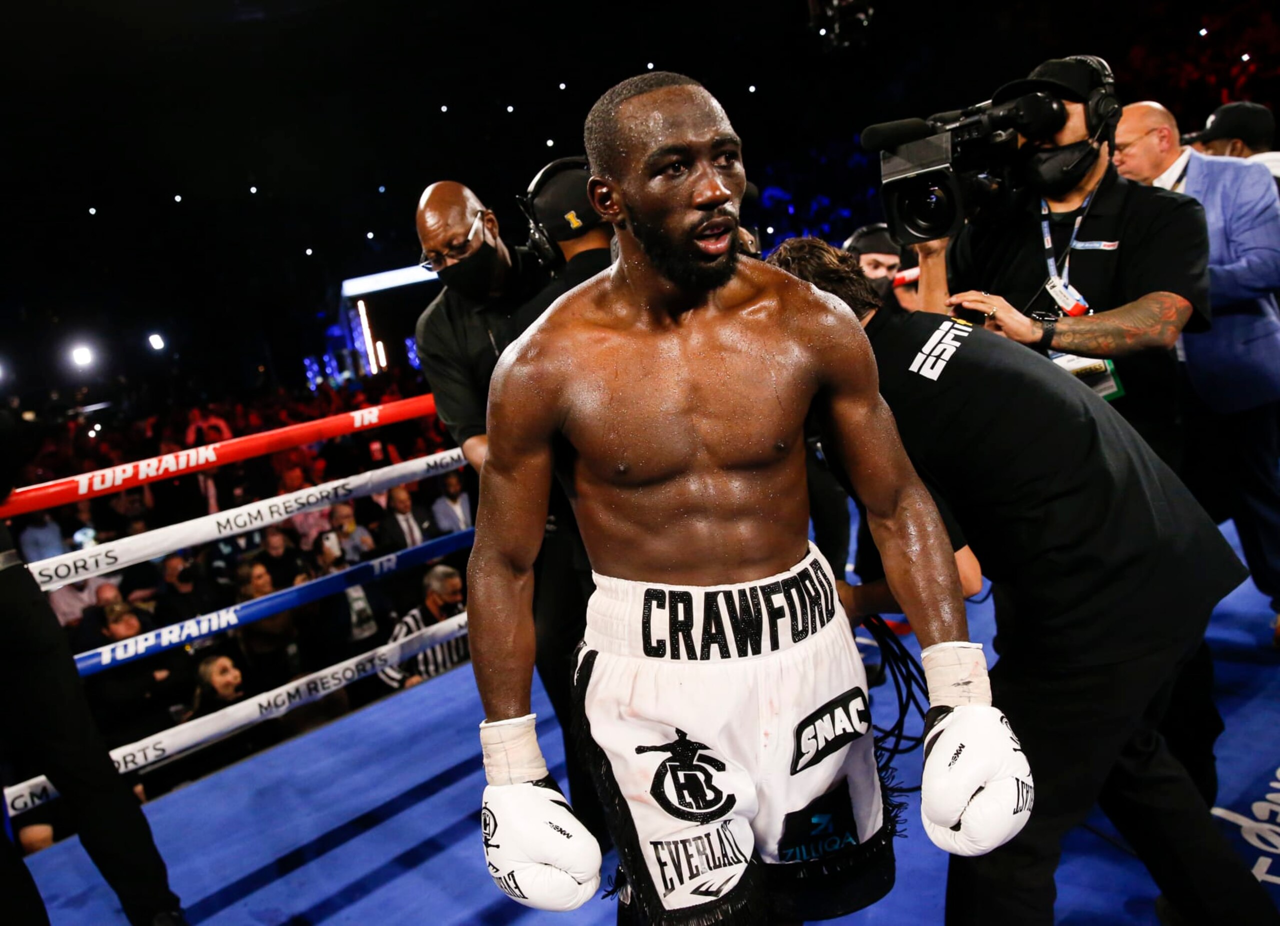 Terence Crawford looks on after defeating Shawn Porter via TKO in a welterweight title boxing match Saturday, Nov. 20, 2021, in Las Vegas. (AP Photo/Chase Stevens)
