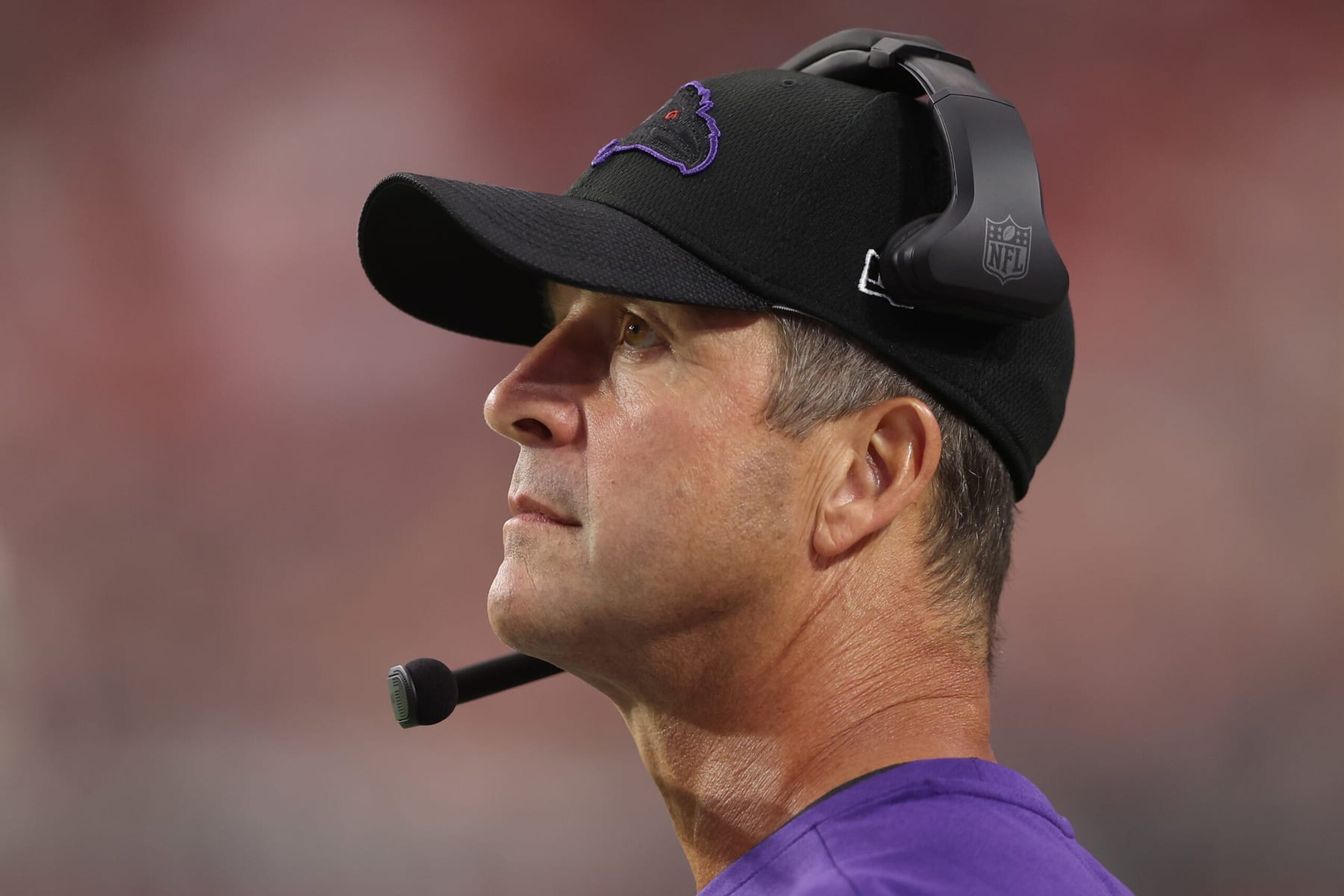 GLENDALE, ARIZONA - AUGUST 21: Head coach John Harbaugh of the Baltimore Ravens looks on during the first half of the NFL preseason game against the Arizona Cardinals at State Farm Stadium on August 21, 2022 in Glendale, Arizona. (Photo by Christian Petersen/Getty Images)