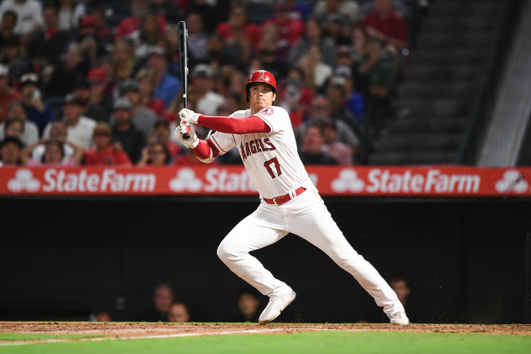 ANAHEIM, CA - SEPTEMBER 30: Los Angeles Angels designated hitter Shohei Ohtani (17) singles during the MLB game between the Texas Rangers and the Los Angeles Angels of Anaheim on September 30, 2022 at Angel Stadium of Anaheim in Anaheim, CA. (Photo by Brian Rothmuller/Icon Sportswire via Getty Images)