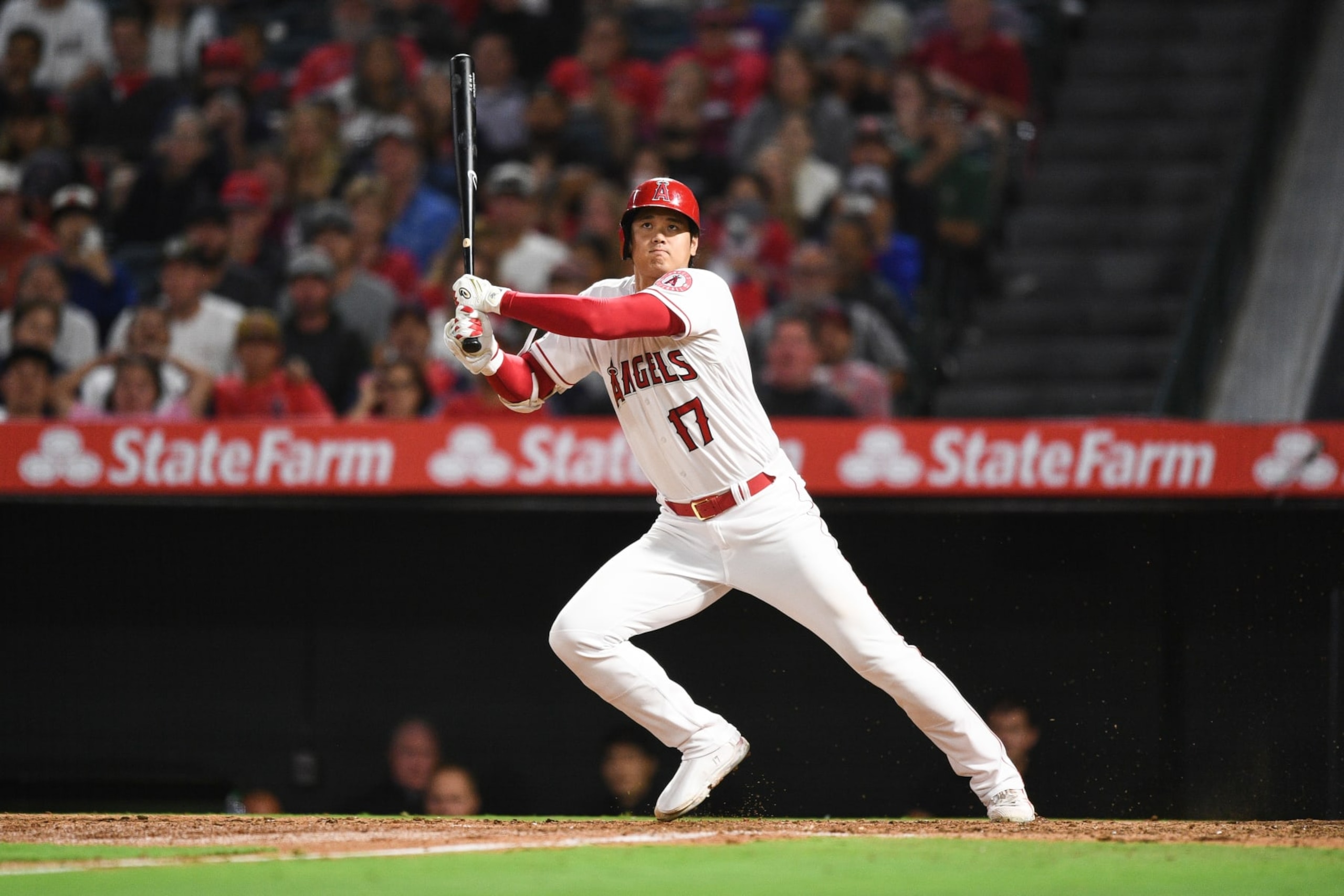 ANAHEIM, CA - SEPTEMBER 30: Los Angeles Angels designated hitter Shohei Ohtani (17) singles during the MLB game between the Texas Rangers and the Los Angeles Angels of Anaheim on September 30, 2022 at Angel Stadium of Anaheim in Anaheim, CA. (Photo by Brian Rothmuller/Icon Sportswire via Getty Images)