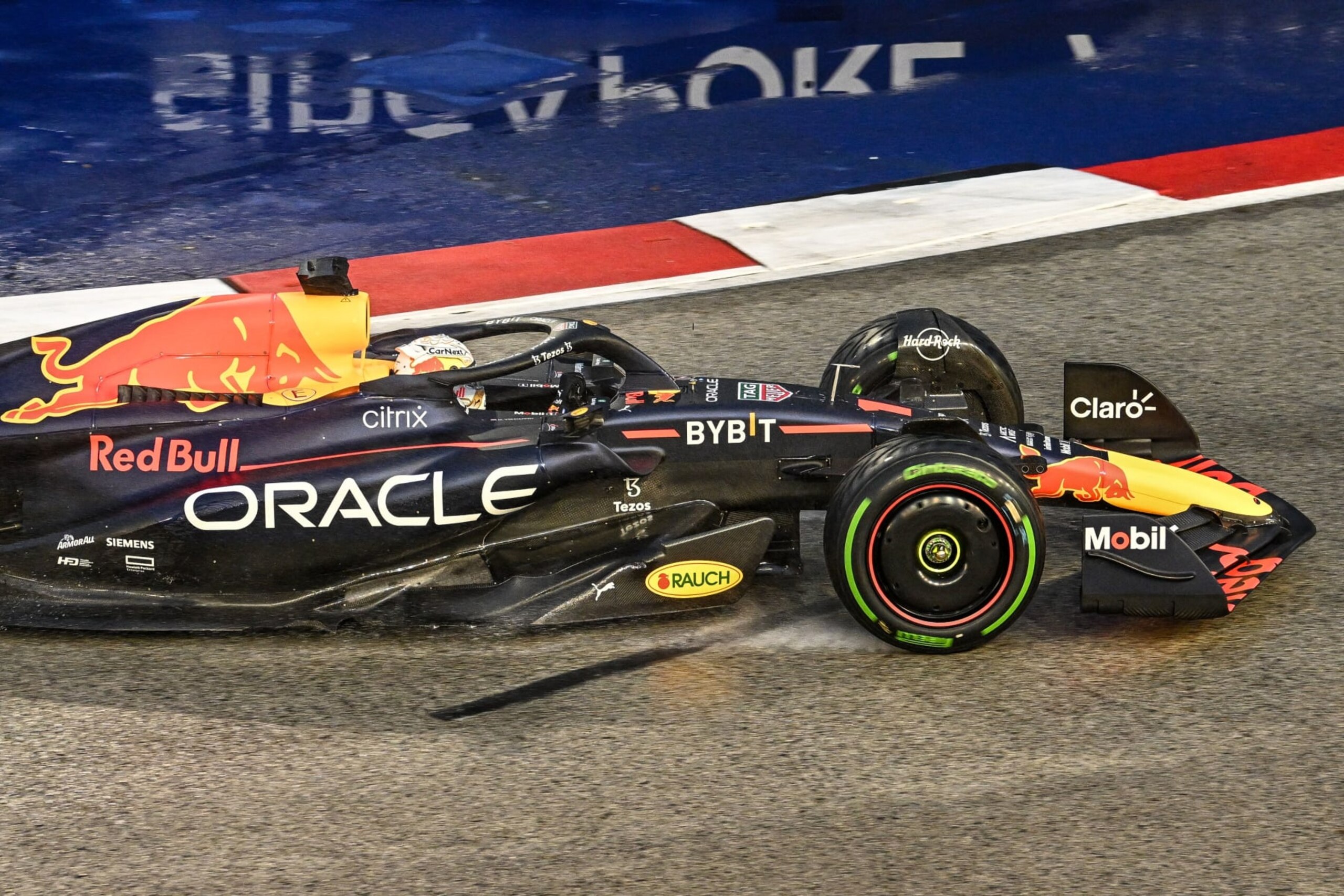 Red Bull Racing's Dutch driver Max Verstappen drives during a practice session ahead of the Formula One Singapore Grand Prix night race at the Marina Bay Street Circuit in Singapore on October 1, 2022. (Photo by ROSLAN RAHMAN / AFP) (Photo by ROSLAN RAHMAN/AFP via Getty Images)