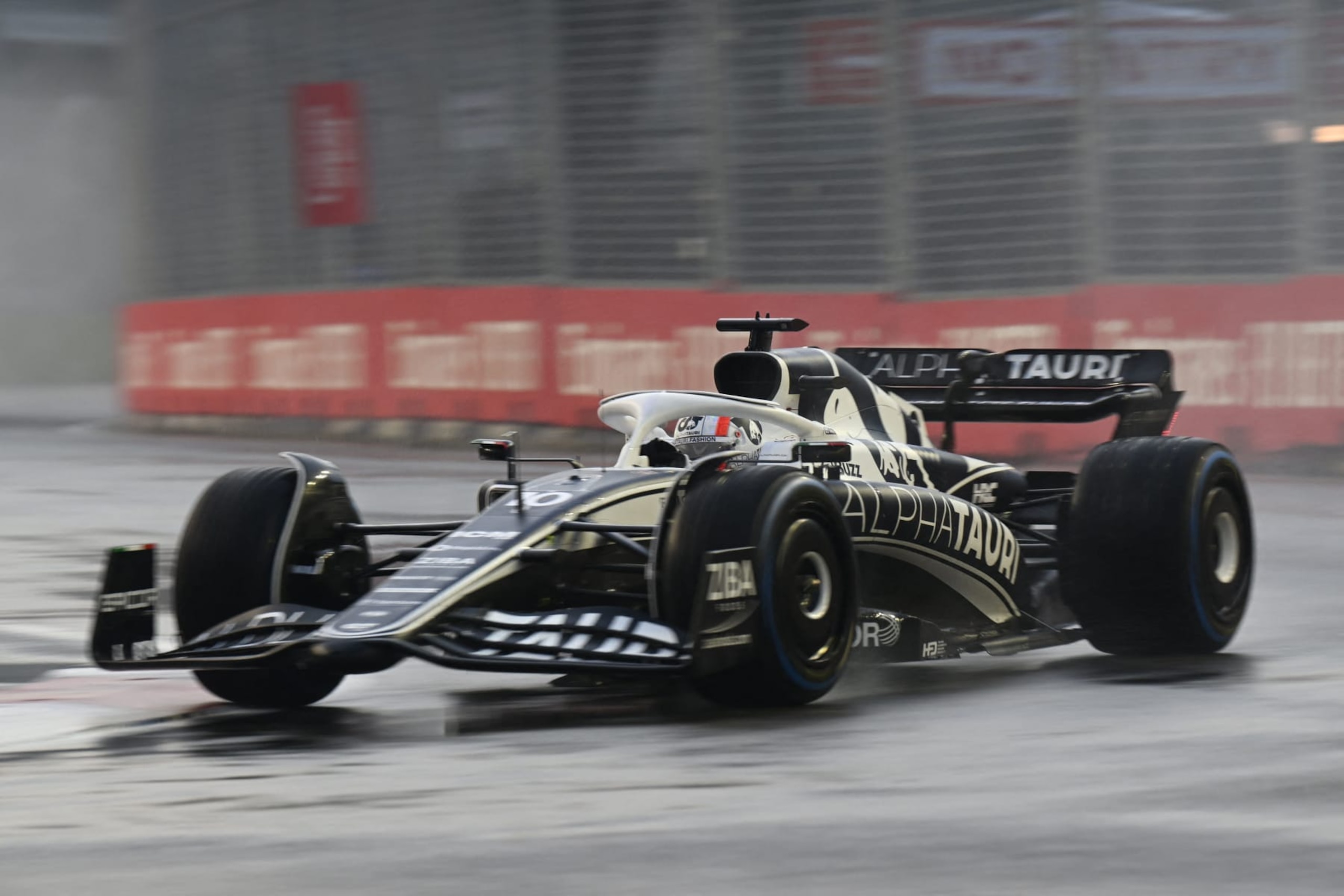 AlphaTauri's French driver Pierre Gasly drives during a practice session ahead of the Formula One Singapore Grand Prix night race at the Marina Bay Street Circuit in Singapore on October 1, 2022. (Photo by Lillian SUWANRUMPHA / AFP) (Photo by LILLIAN SUWANRUMPHA/AFP via Getty Images)