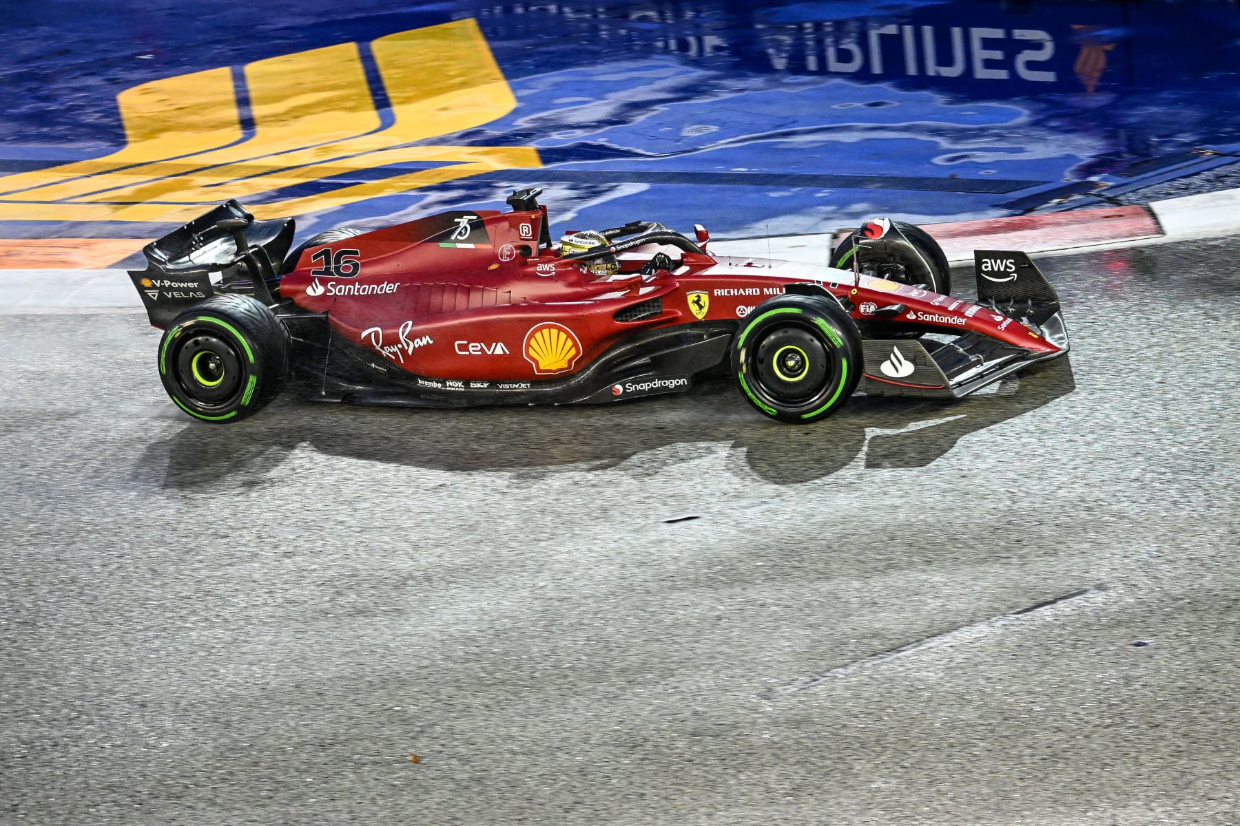 Ferrari's Monegasque driver Charles Leclerc drives during a practice session ahead of the Formula One Singapore Grand Prix night race at the Marina Bay Street Circuit in Singapore on October 1, 2022. (Photo by ROSLAN RAHMAN / AFP) (Photo by ROSLAN RAHMAN/AFP via Getty Images)