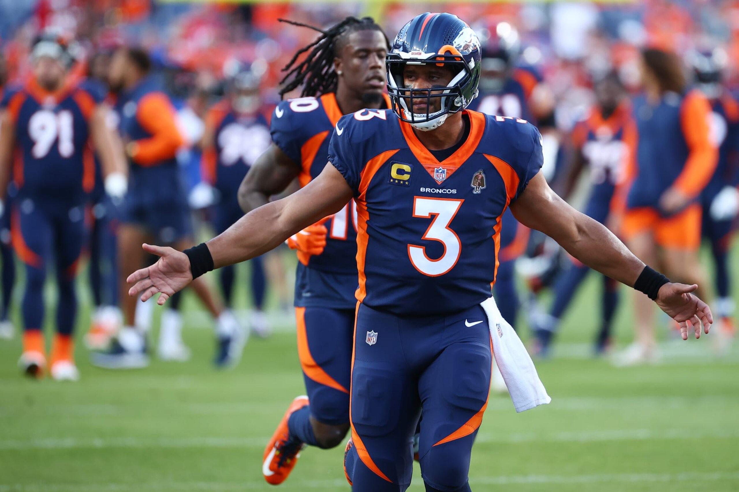 DENVER, CO - SEPTEMBER 25: Russell Wilson #3 of the Denver Broncos warms up against the San Francisco 49ers at Empower Field At Mile High on September 25, 2022 in Denver, Colorado. (Photo by Jamie Schwaberow/Getty Images)