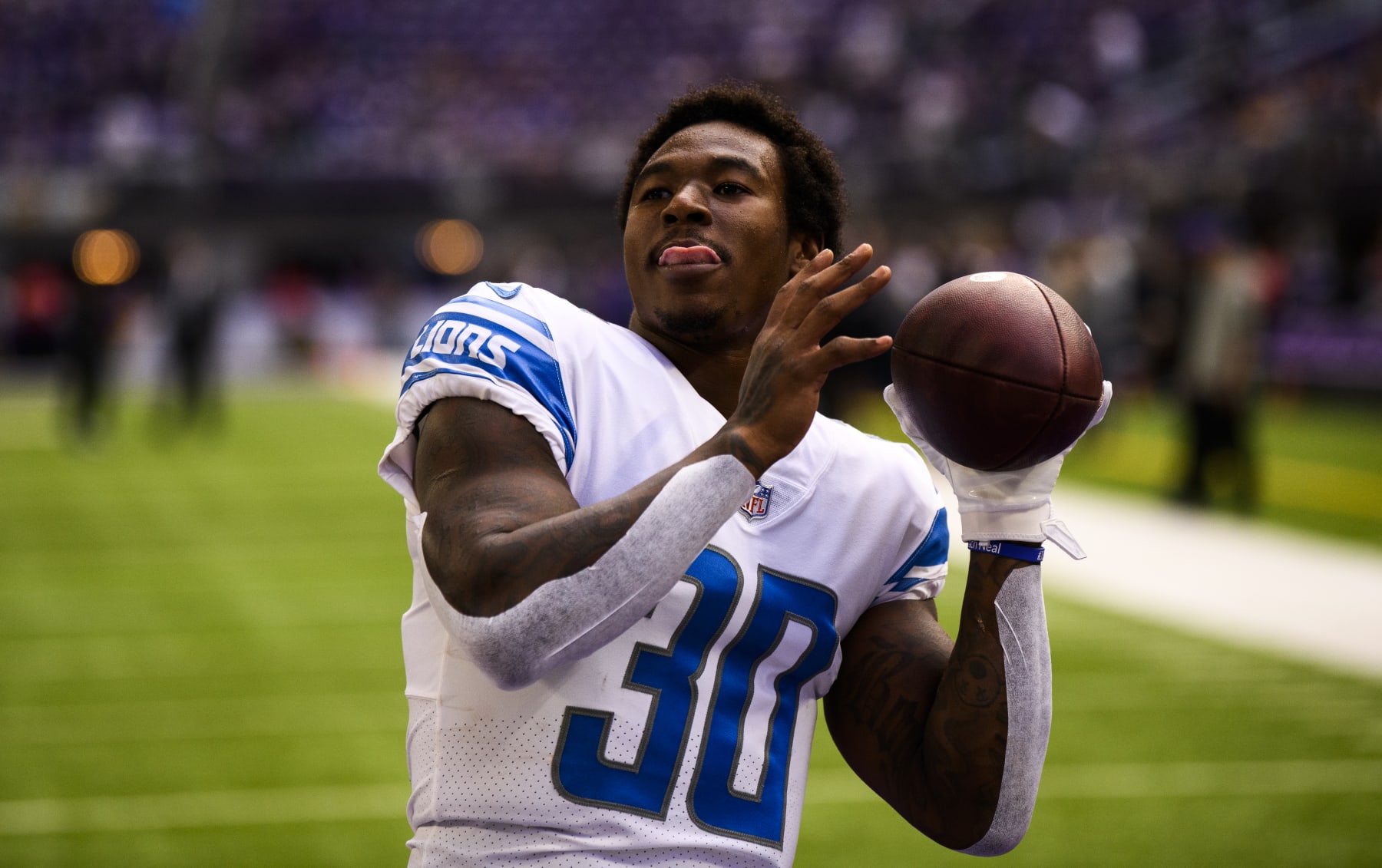 MINNEAPOLIS, MN - SEPTEMBER 25: Jamaal Williams #30 of the Detroit Lions warms up before the game against the Minnesota Vikings at U.S. Bank Stadium on September 25, 2022 in Minneapolis, Minnesota. (Photo by Stephen Maturen/Getty Images)