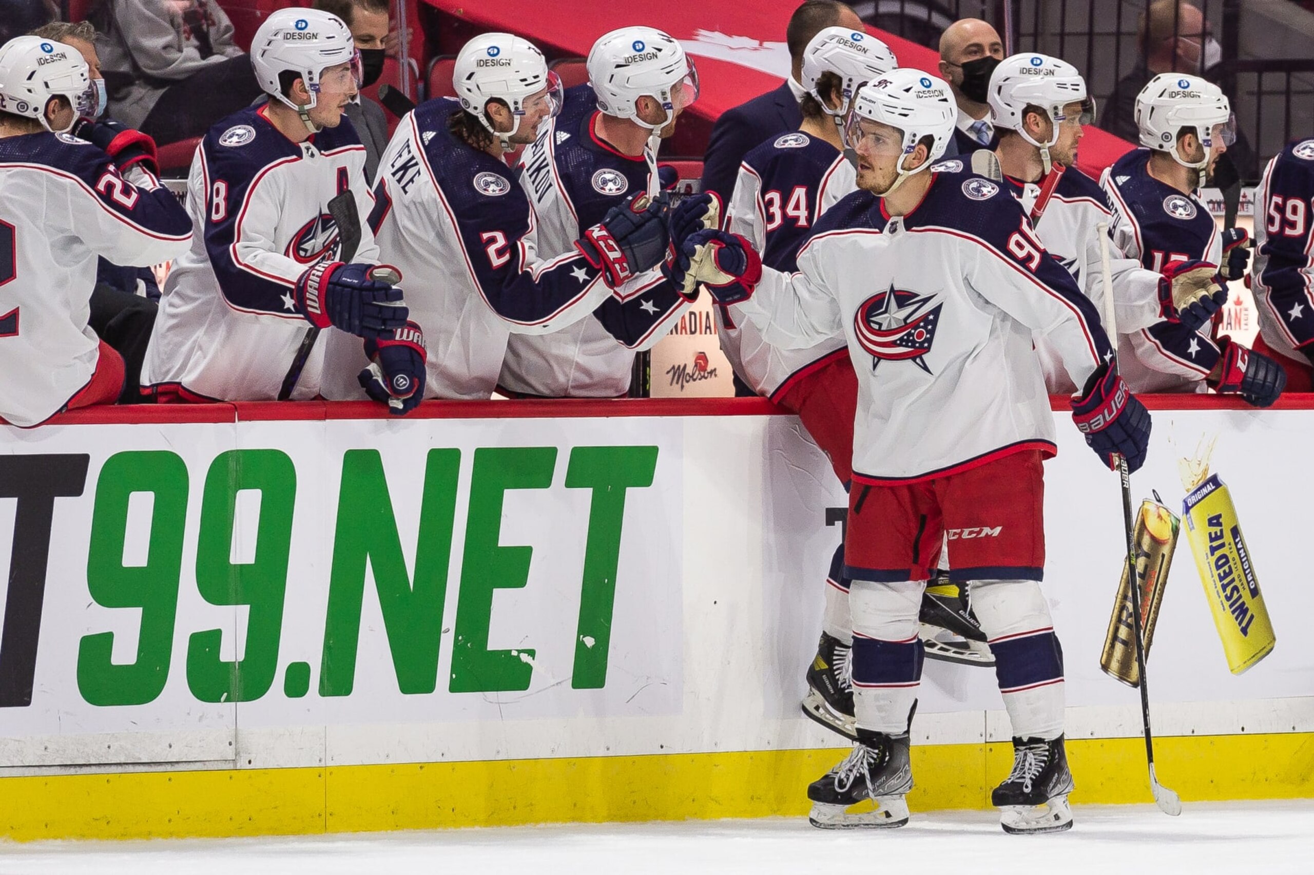 OTTAWA, ON - MARCH 16: Columbus Blue Jackets Center Jack Roslovic (96) celebrates a second period goal against the Ottawa Senators at the team bench during the NHL game on March 16, 2022 at the Canadian Tire Centre in Ottawa, Ontario, Canada. (Photo by Steven Kingsman/Icon Sportswire via Getty Images)
