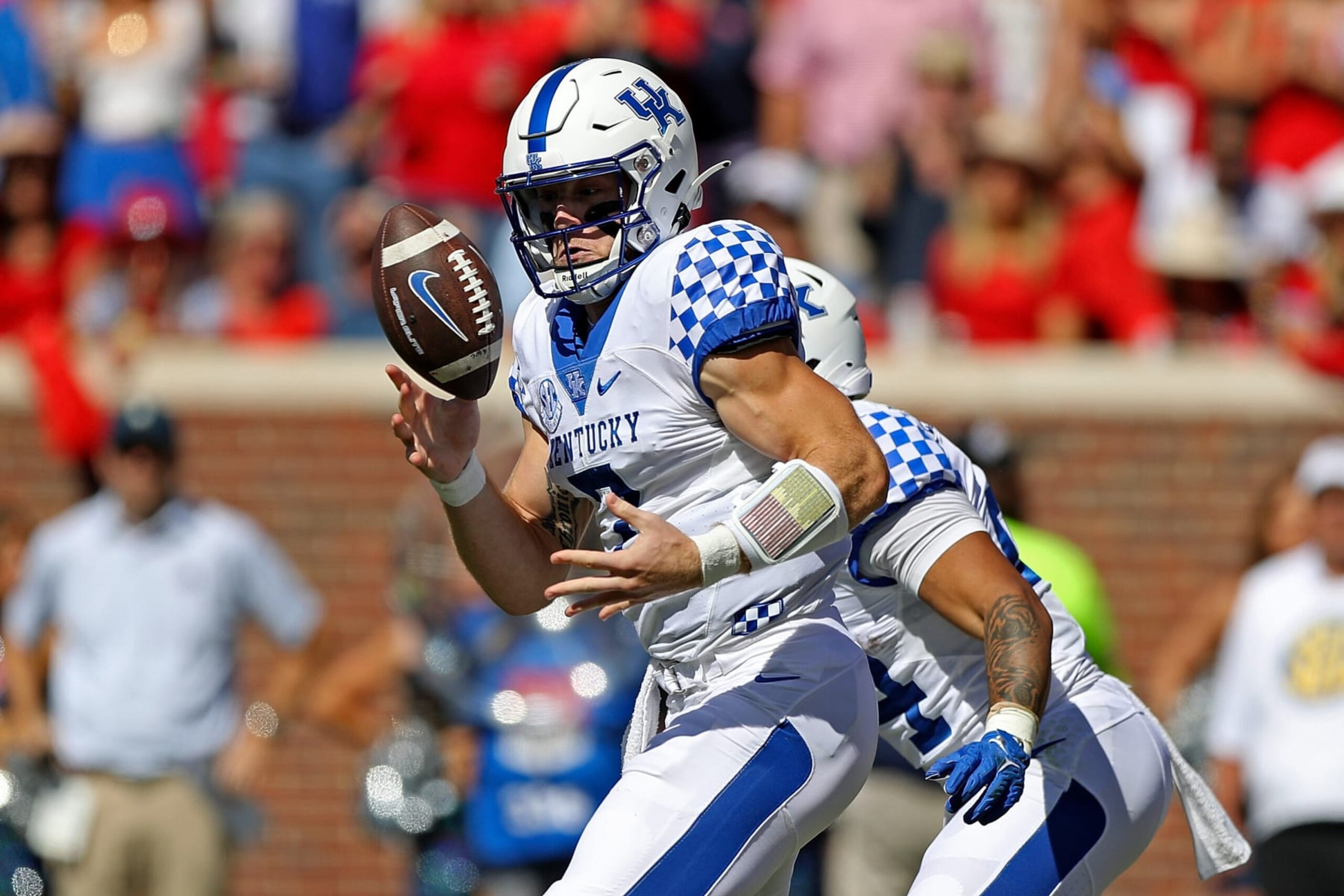 OXFORD, MISSISSIPPI - OCTOBER 01: Will Levis #7 of the Kentucky Wildcats looks to control the ball during the first half against the Kentucky Wildcats at Vaught-Hemingway Stadium on October 01, 2022 in Oxford, Mississippi. (Photo by Justin Ford/Getty Images)