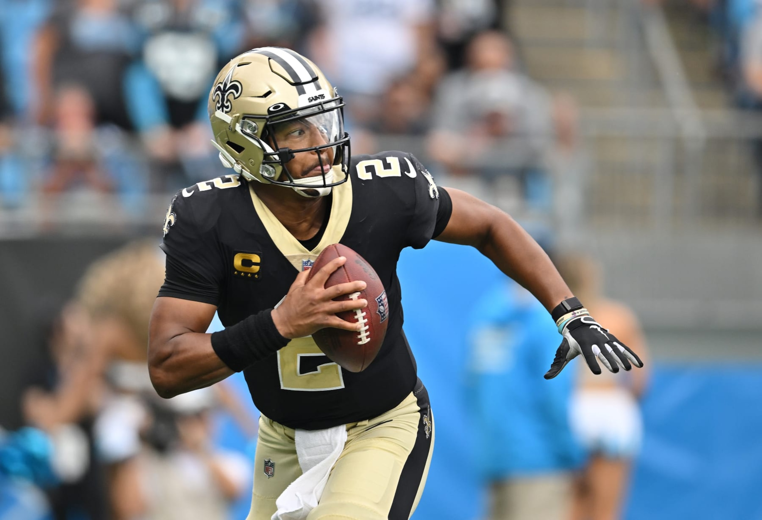CHARLOTTE, NORTH CAROLINA - SEPTEMBER 25: Jameis Winston #2 of the New Orleans Saints rolls out against the Carolina Panthers during their game at Bank of America Stadium on September 25, 2022 in Charlotte, North Carolina. (Photo by Grant Halverson/Getty Images)