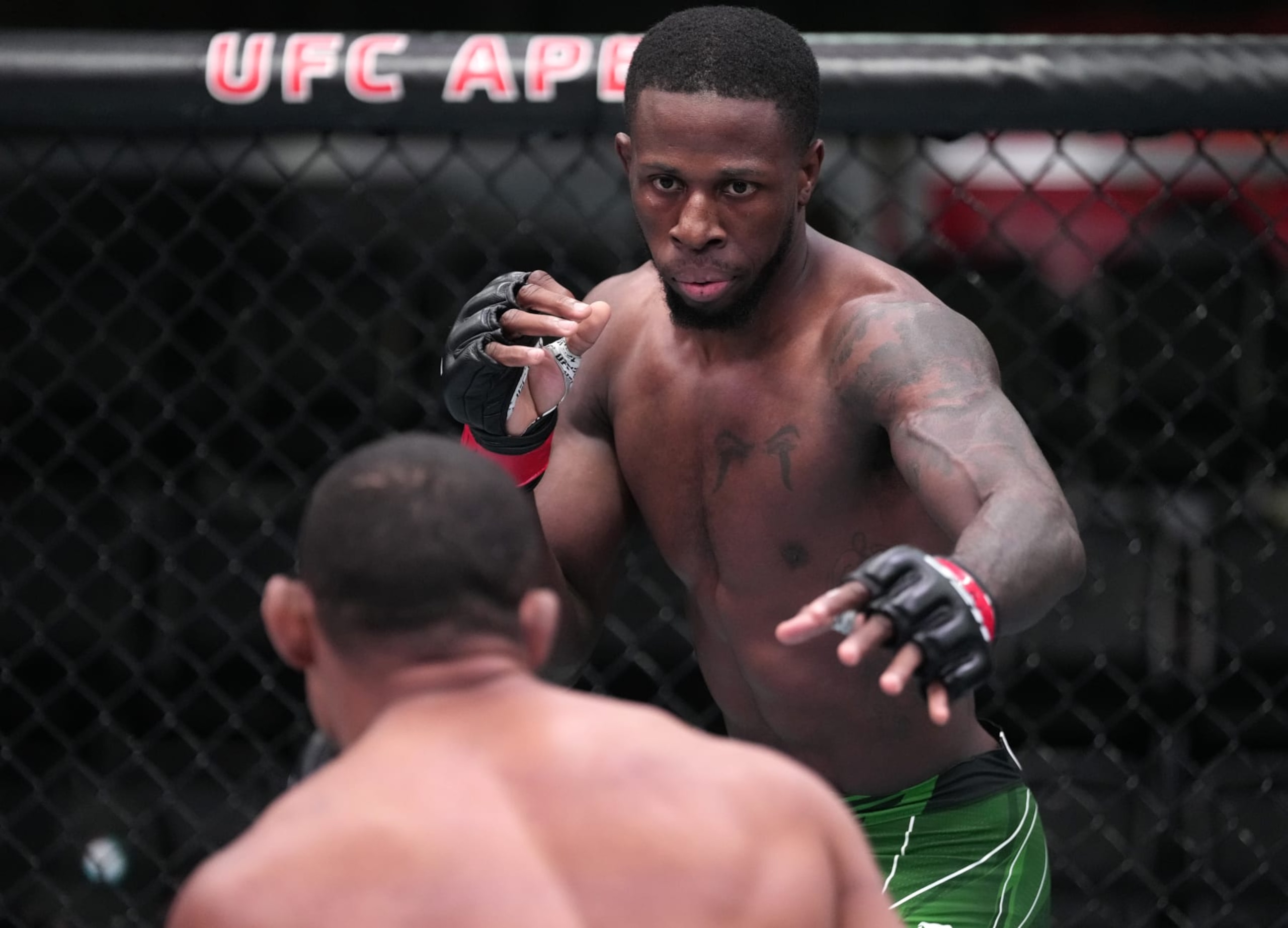 LAS VEGAS, NEVADA - OCTOBER 01: (R-L) Randy Brown of Jamaica battles Francisco Trinaldo of Brazil in a welterweight fight during the UFC Fight Night event at UFC APEX on October 01, 2022 in Las Vegas, Nevada. (Photo by Jeff Bottari/Zuffa LLC)
