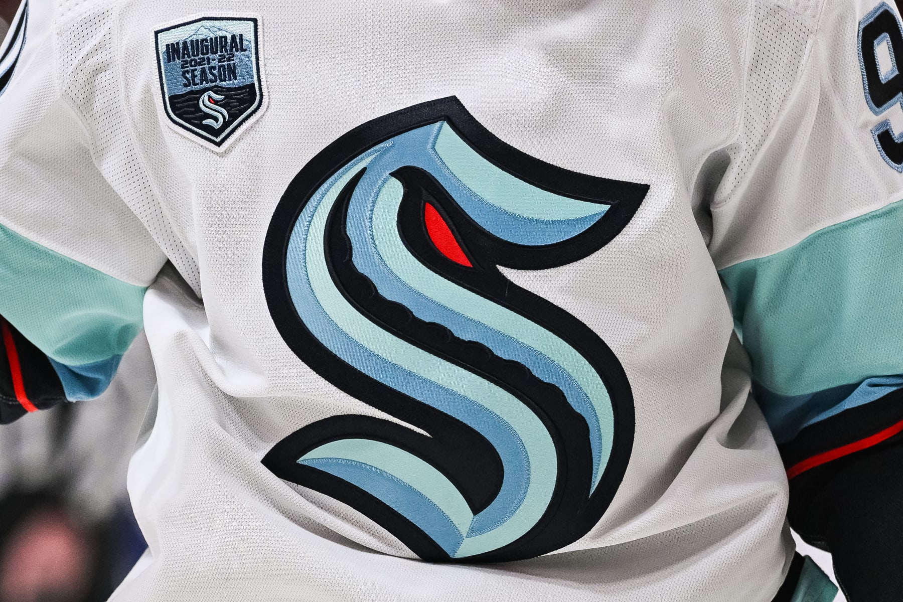 MONTREAL, QC - MARCH 12: View of a Seattle Kraken logo on a jersey worn by a member of the team during the Seattle Kraken versus the Montreal Canadiens game on March 12, 2022 at Centre Bell in Montreal, QC (Photo by David Kirouac/Icon Sportswire via Getty Images)