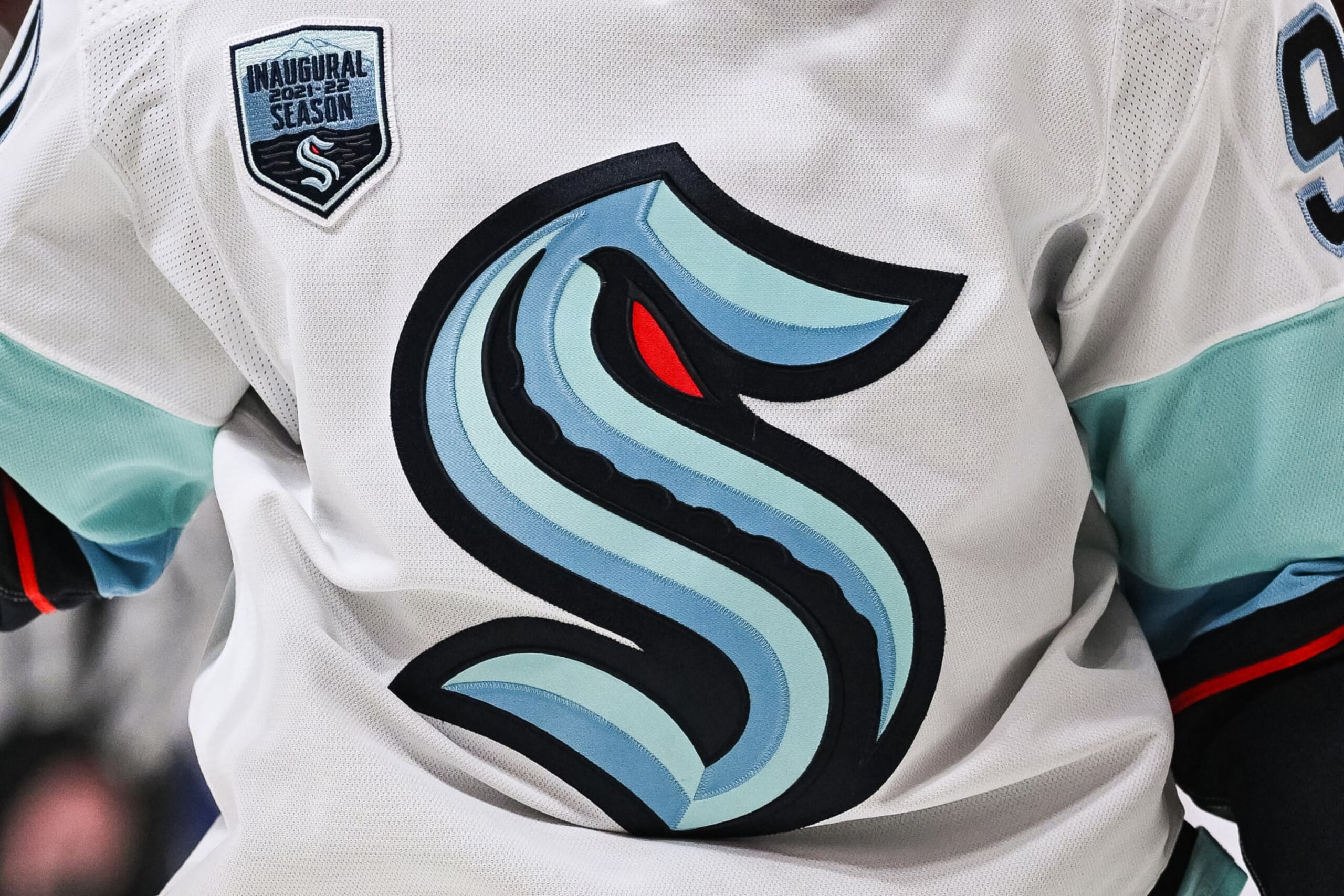 MONTREAL, QC - MARCH 12: View of a Seattle Kraken logo on a jersey worn by a member of the team during the Seattle Kraken versus the Montreal Canadiens game on March 12, 2022 at Centre Bell in Montreal, QC (Photo by David Kirouac/Icon Sportswire via Getty Images) MONTREAL, QC - MARCH 12: View of a Seattle Kraken logo on a jersey worn by a member of the team during the Seattle Kraken versus the Montreal Canadiens game on March 12, 2022 at Centre Bell in Montreal, QC (Photo by David Kirouac/Icon Sportswire via Getty Images)